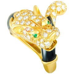 J. P. Bellin Diamonds, 2 Emeralds, and Onyx Yellow Gold Panther Ring