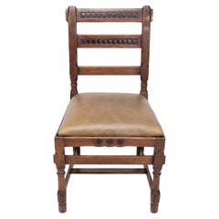 J P Seddon attri. An Aesthetic Movement oak side chair with ebonized circles