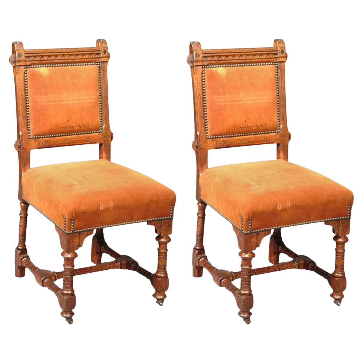 John Pollard Seddon (1827-1906), six Gothic Revival oak dining chairs.

These upholstered dining chairs are the side chairs en suite to the important Gothic Revival armchair by J P Seddon designed for The Great Exhibition of 1851, carved in oak,