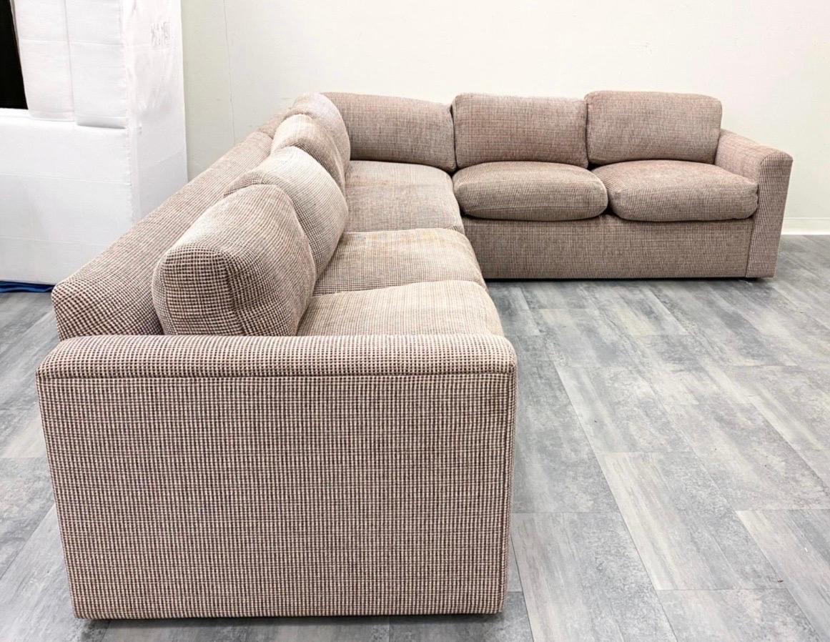 Elegant and coveted large two piece L-shaped sectional sofa in a luxurious brown weave fabric by J. Robert Scott and designed by Sally Sirkin Lewis.
The cushions are white goose / duck feathers / down. Pay close attention to dimensions as this is a