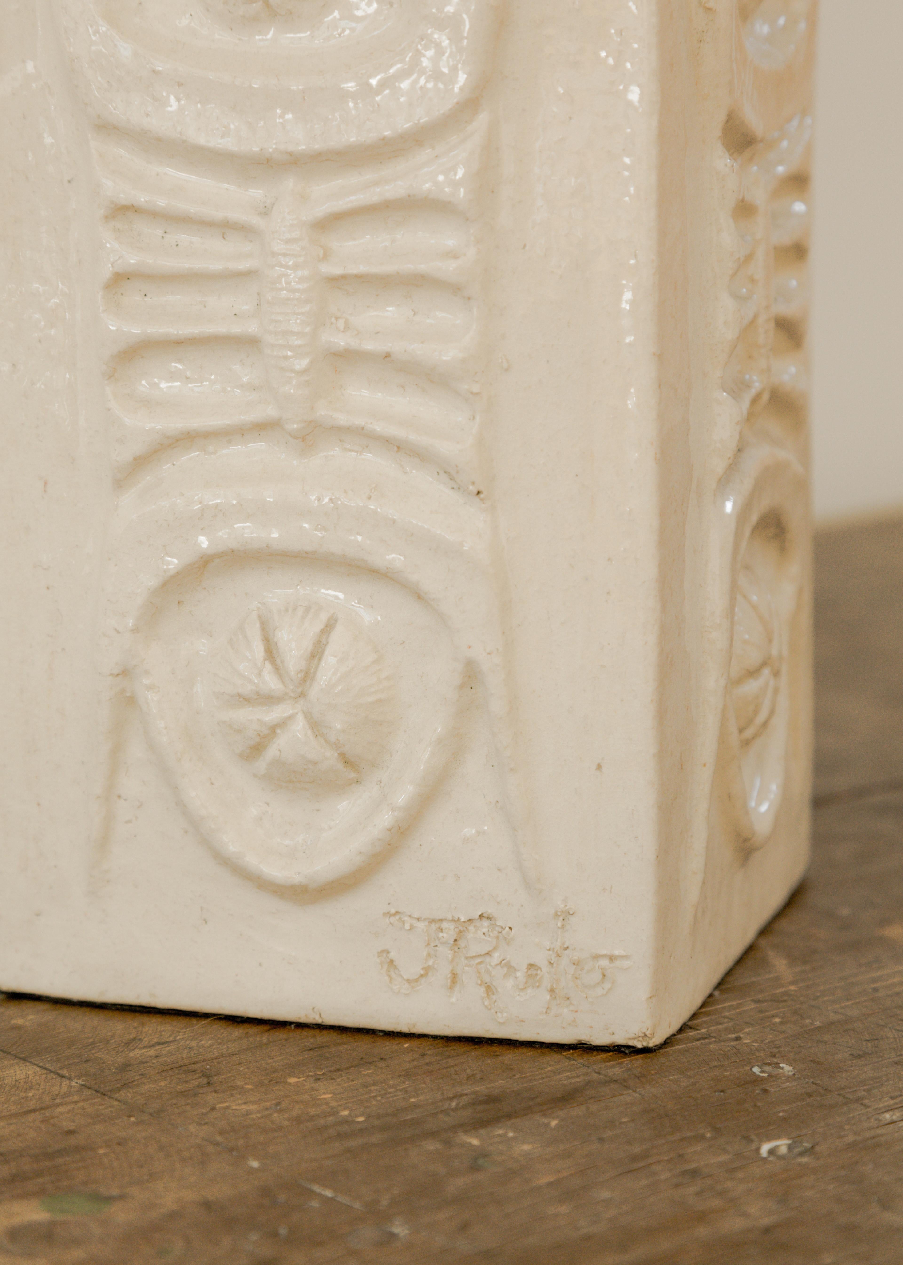 J. Rulo ceramic table lamp with fossil relief design, new wiring and shade, signed. France, circa 1960’s.