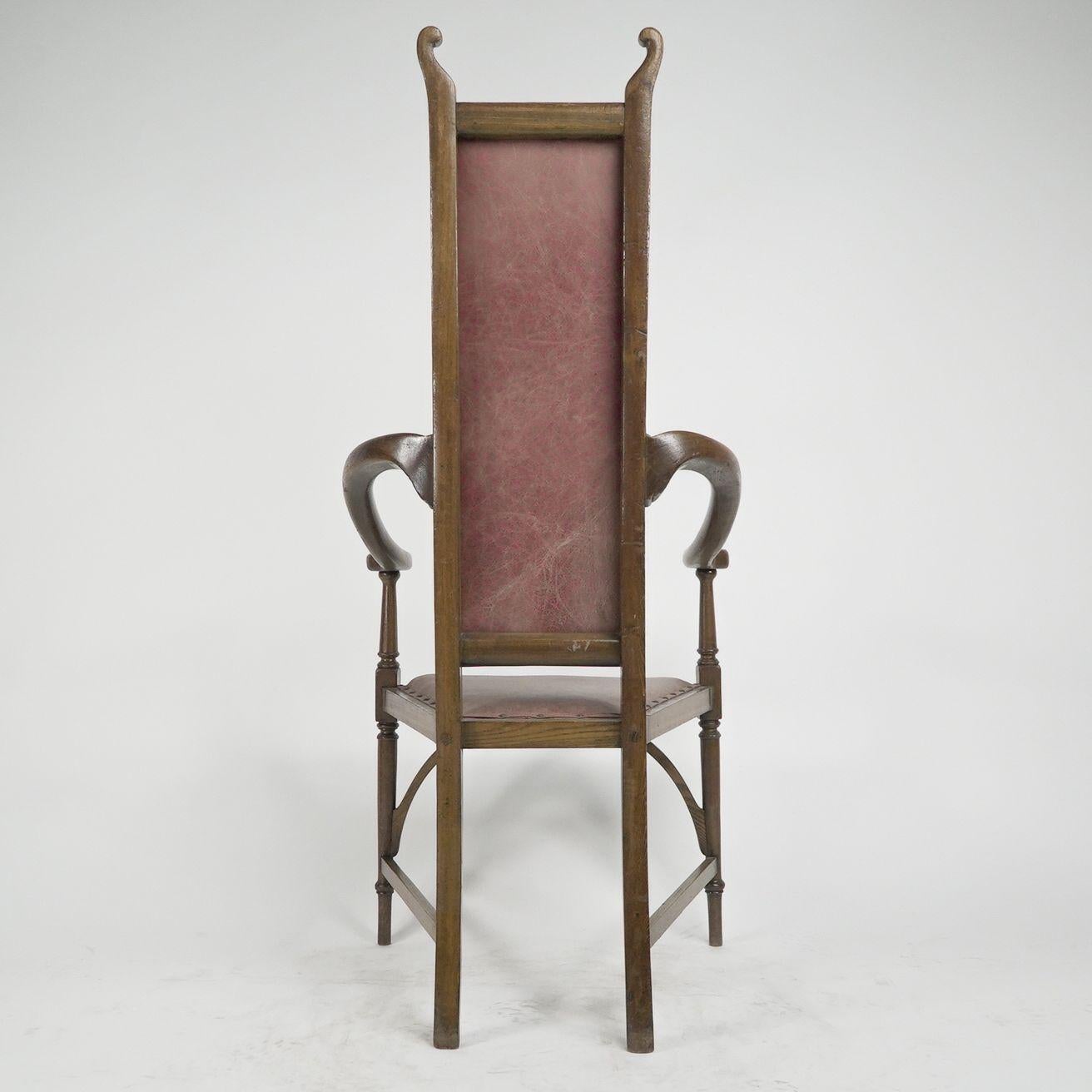 J S Henry. An ash Arts & Crafts armchair with an elongated back & curled ears In Good Condition For Sale In London, GB
