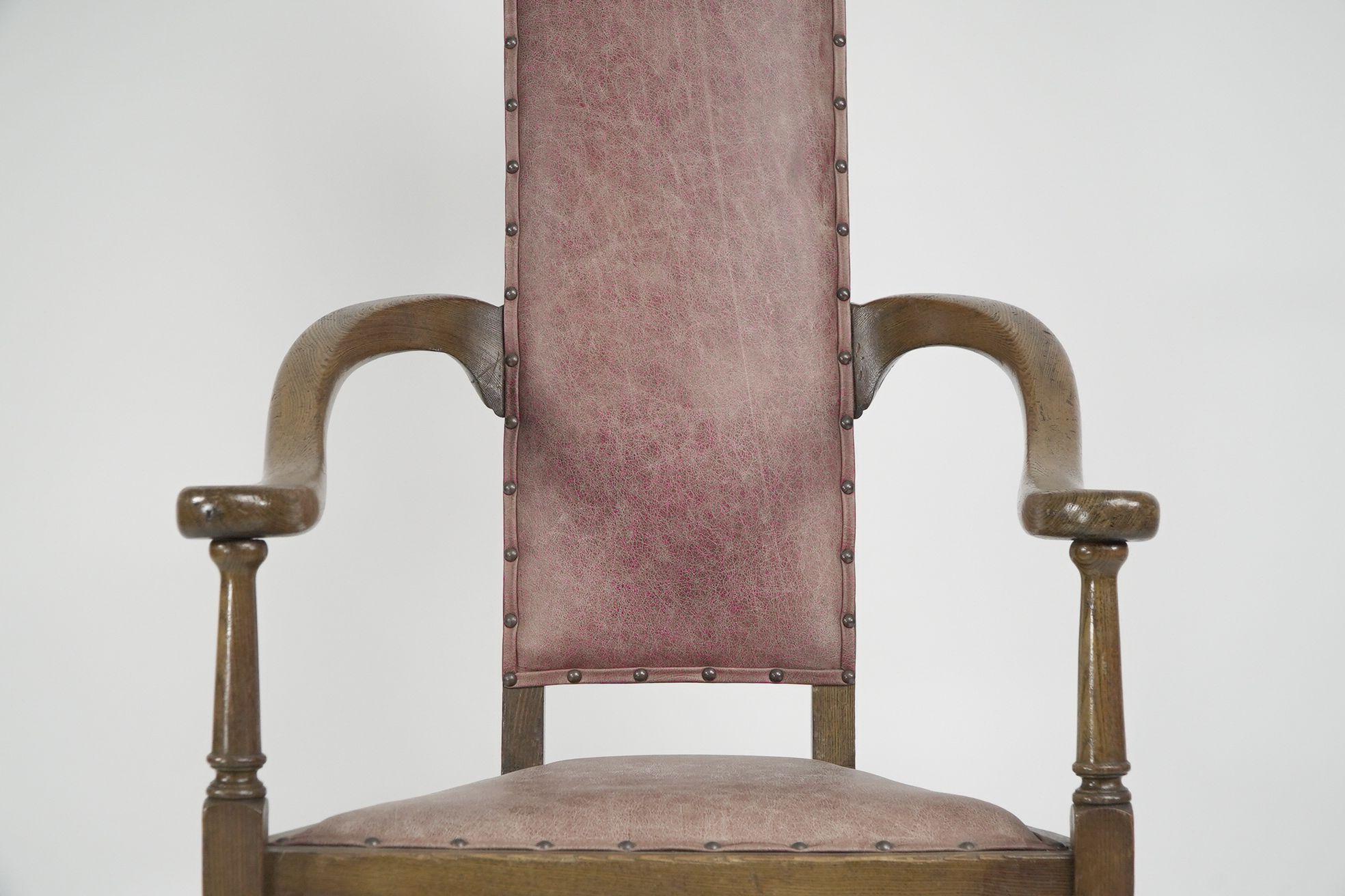 Leather J S Henry. An ash Arts & Crafts armchair with an elongated back & curled ears For Sale