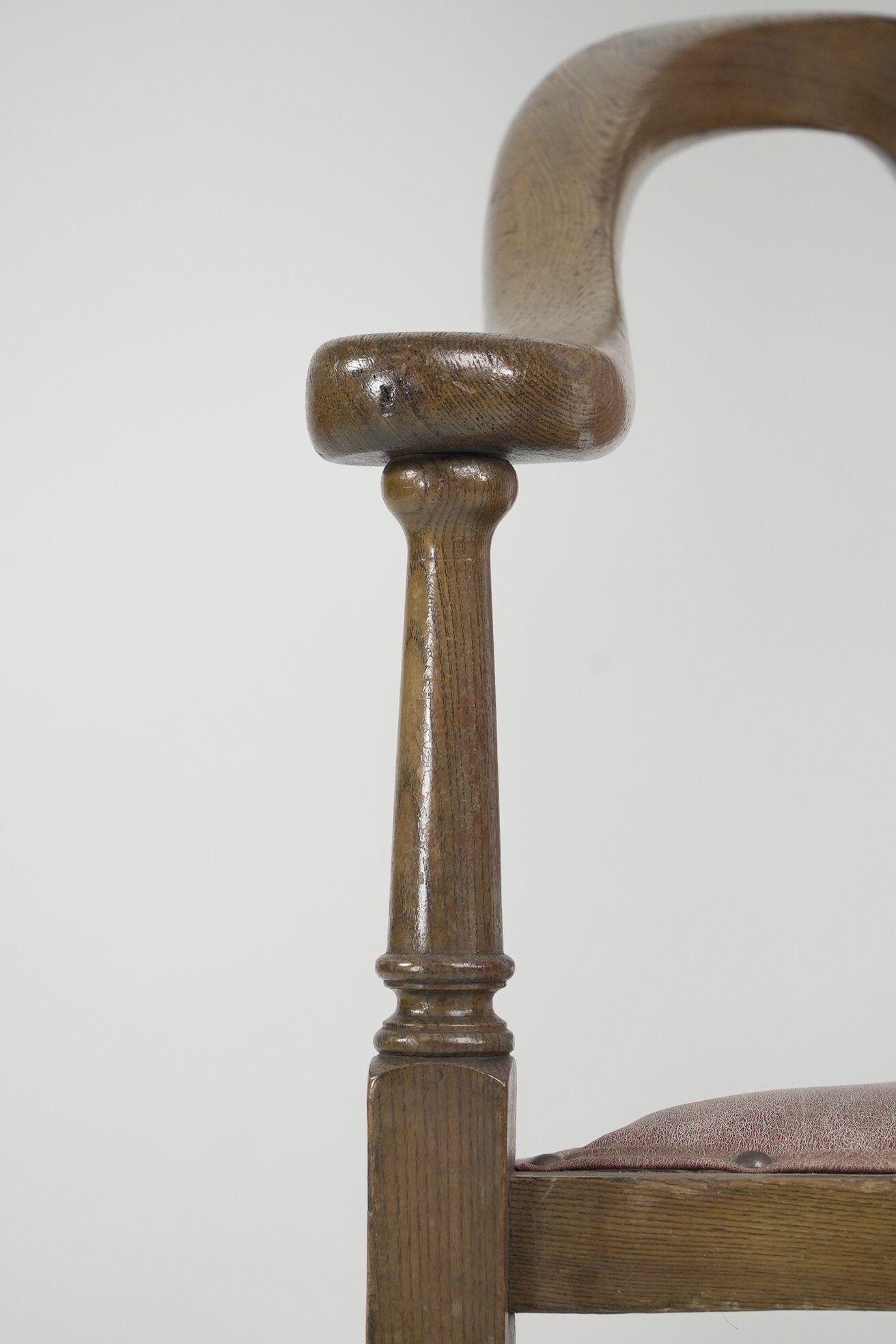 J S Henry. An ash Arts & Crafts armchair with an elongated back & curled ears For Sale 1