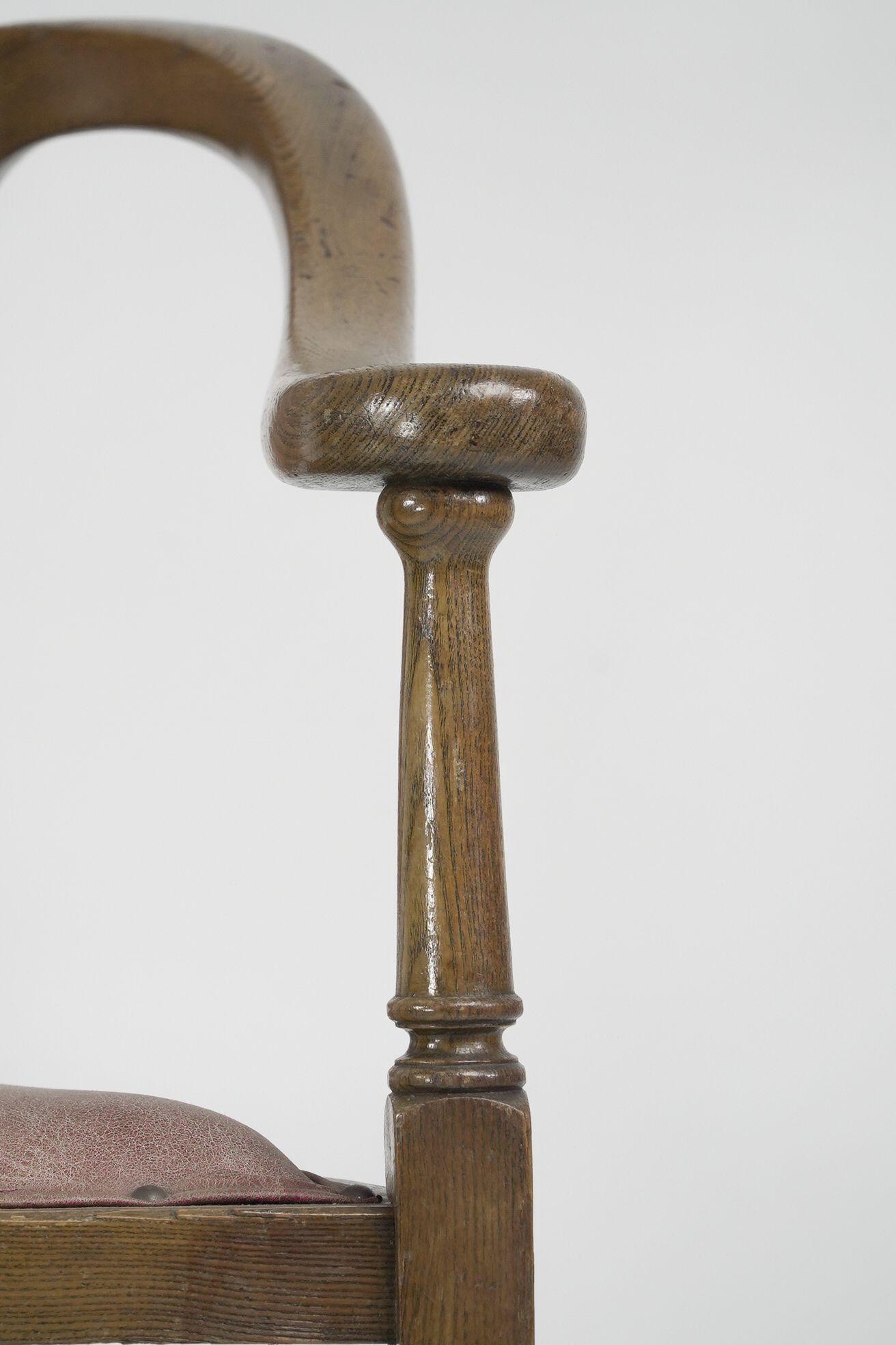 J S Henry. An ash Arts & Crafts armchair with an elongated back & curled ears For Sale 2