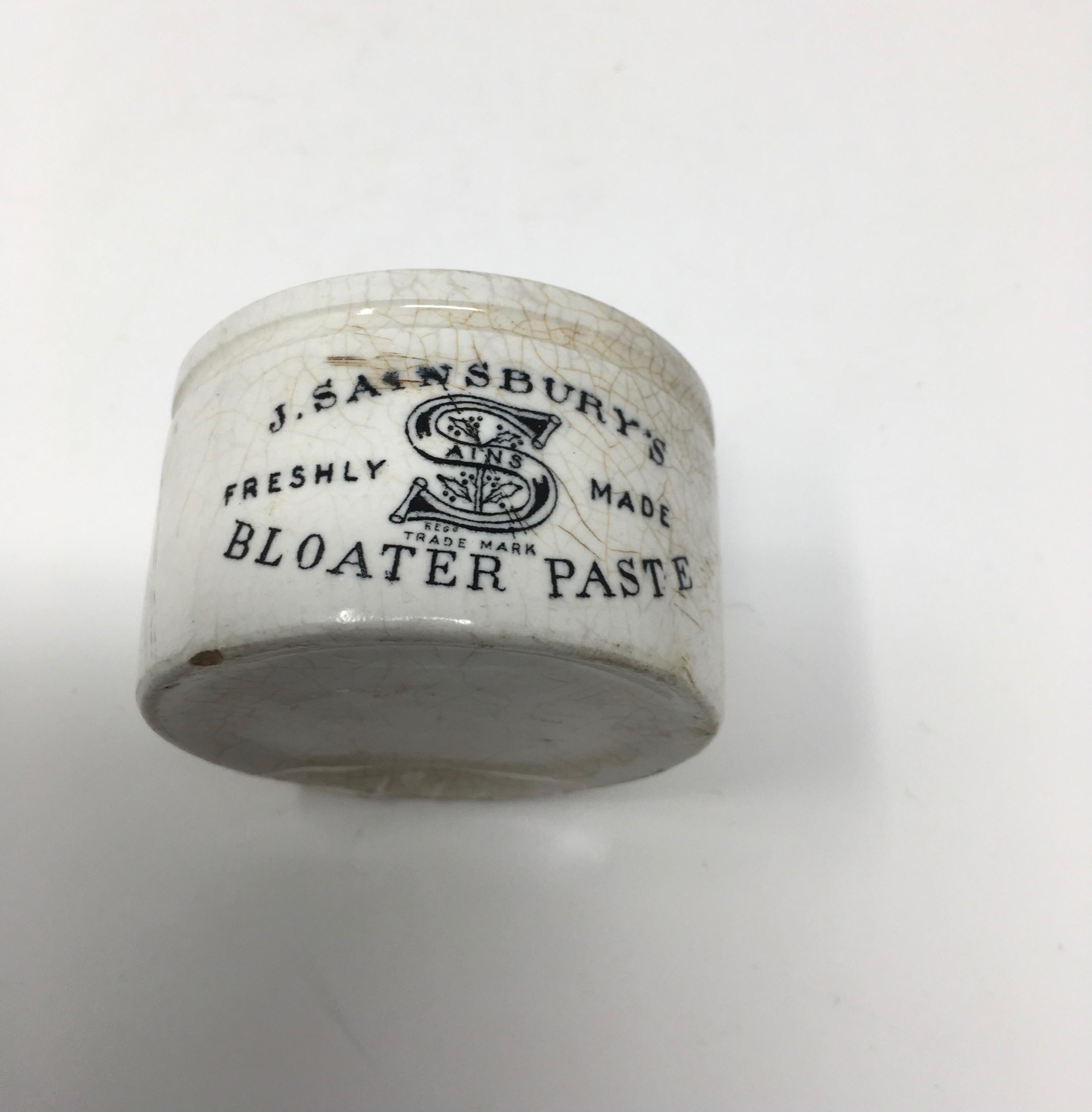 Manufactured in the early 1900s, this ironstone crock was used to sell bloater paste by J. Sainsbury. Bloaters are herring which has been cured by salting and smoking and made into a paste. The 