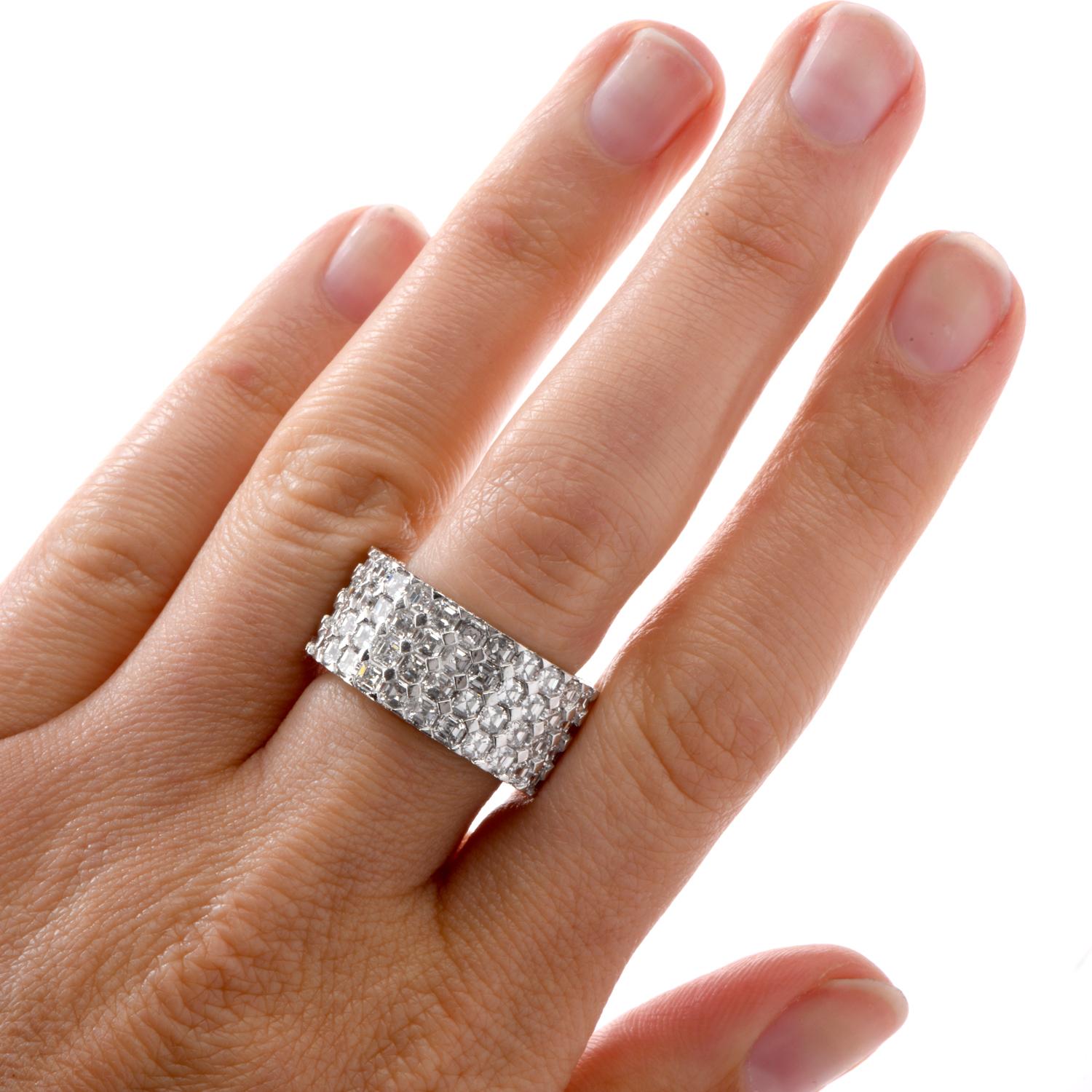 This extraordinary one-of-a-kind J. Stella designed wide eternity band was crafted in 

Luxurious Platinum. 104 Asscher cut diamonds run 4 in a row completely

around this band while 40 round diamonds are prong set

on each side of the
