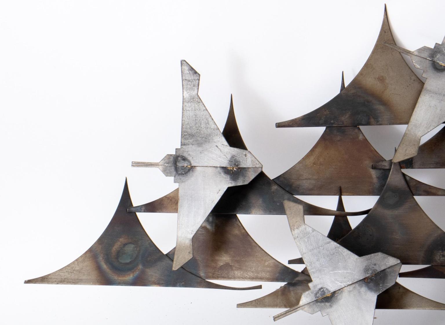J. Stillman (American, XX) Mid-Century Modern Brutalist metal wall sculpture depicting abstract turtles and rays swimming in the ocean, signed to lower right, circa 1970.

Dimensions: 14.65