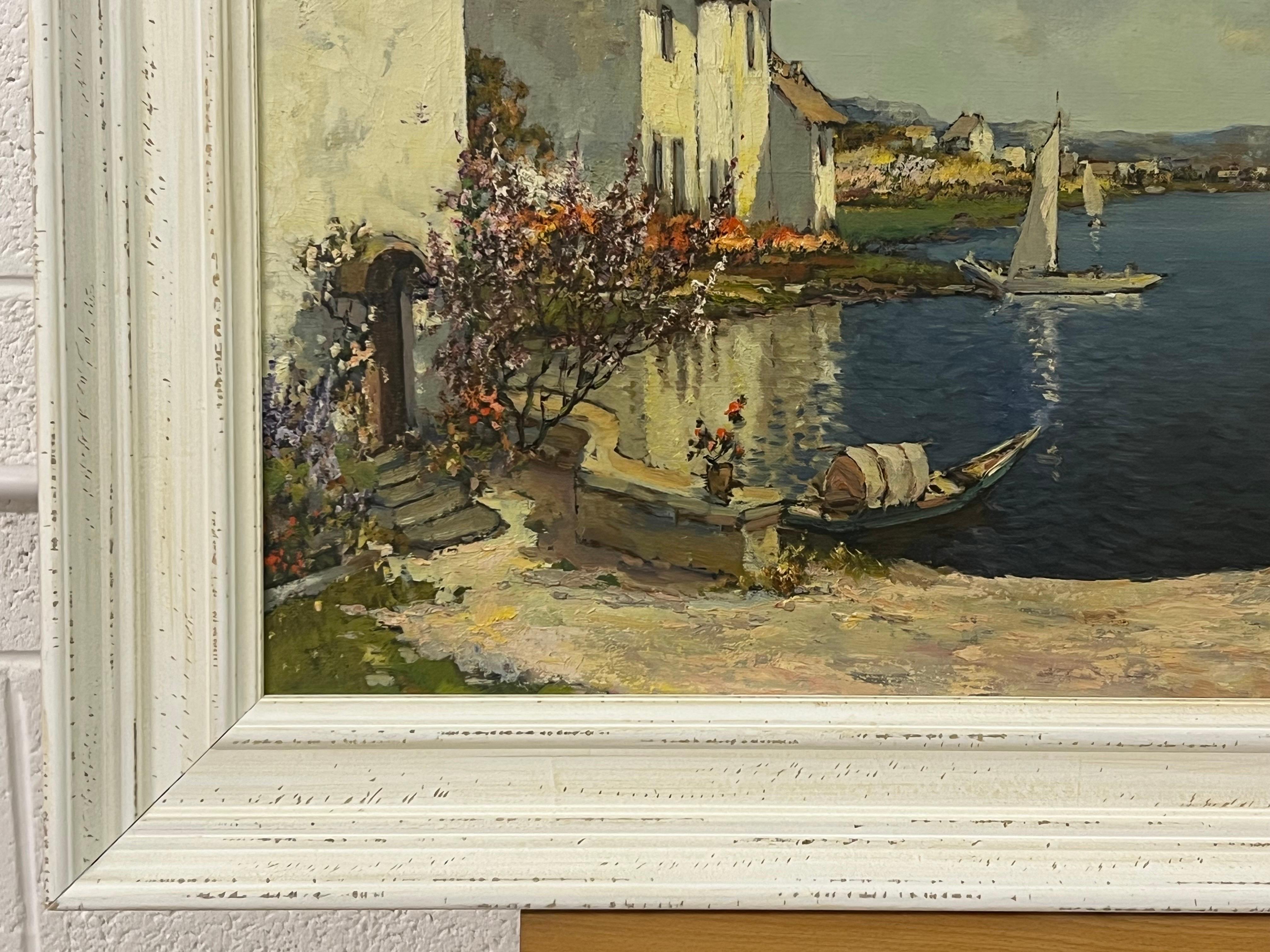 Mediterranean Painting of Lake Como in Italy by 20th Century American Artist, J W Wagner 

Art measures 28 x 20 inches 
Frame measures 33 x 25 inches 

Professionally cleaned and re-framed in a high quality shabby chic off-white moulding 
Early 20th