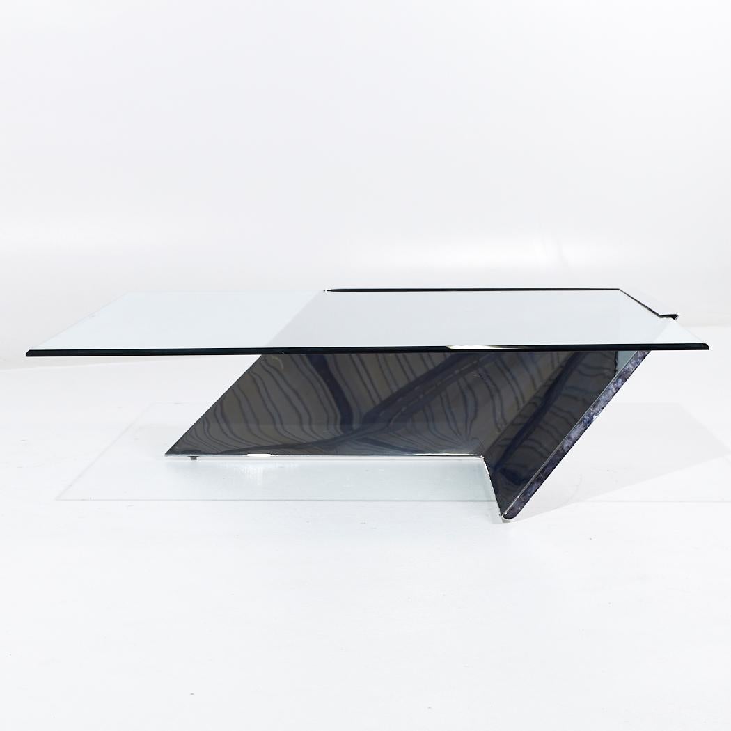 J Wade Beam for Brueton Mid Century Chrome and Glass Square Coffee Table

This coffee table measures: 48.75 wide x 48.75 deep x 14 inches high

All pieces of furniture can be had in what we call restored vintage condition. That means the piece is