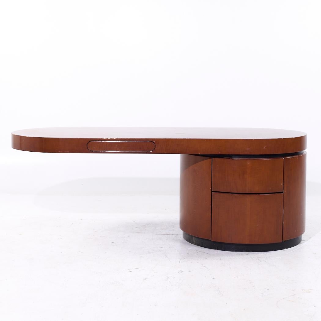 J. Wade Beam for Brueton Ponte Mid Century Walnut Cantilever Desk

This desk measures: 83.75 wide x 35.75 deep x 30 high, with a chair clearance of 26 inches

All pieces of furniture can be had in what we call restored vintage condition. That means