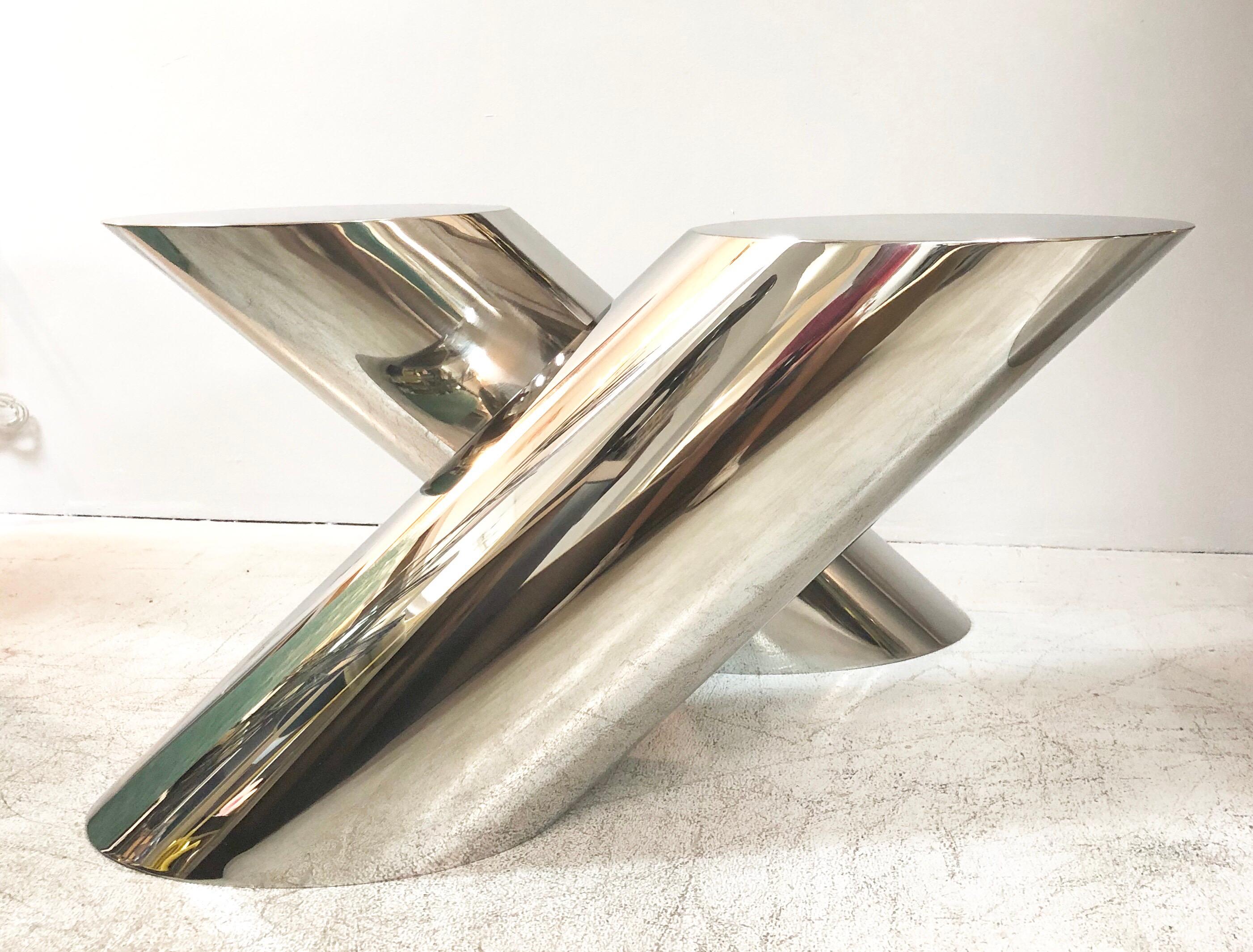 The Zephyr table by Brueton. Designed by J. Wade Beam, this table has become a classic due to its uncanny ability to evoke grace and motion. The top is 12