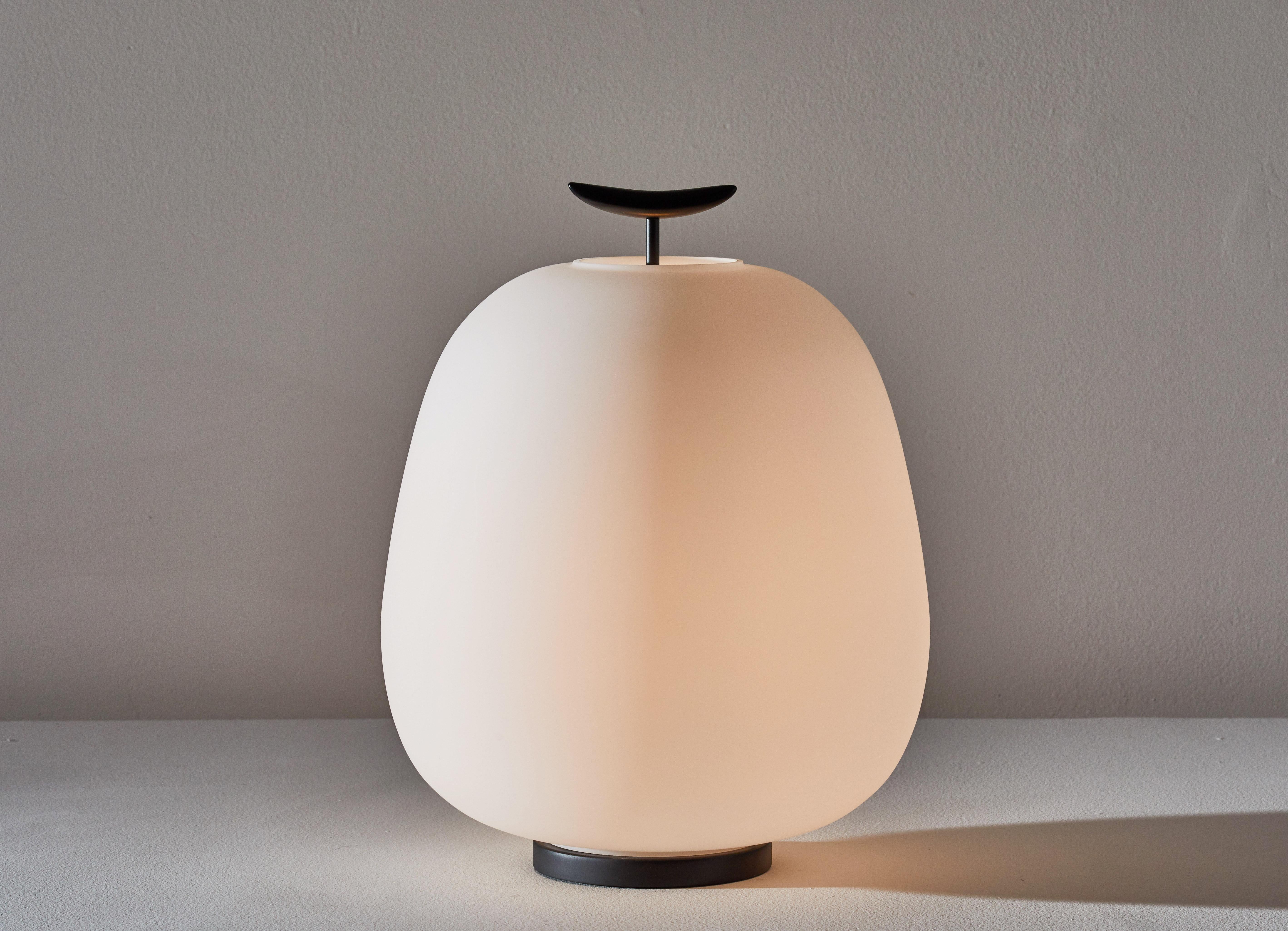 J13 table lamp by Joseph-André Motte for Disderot. Originally designed in 1959. This is a licensed, current production manufactured in France by Disderot. Brushed satin glass diffuser, enameled metal. Numbered edition, delivered with authentication
