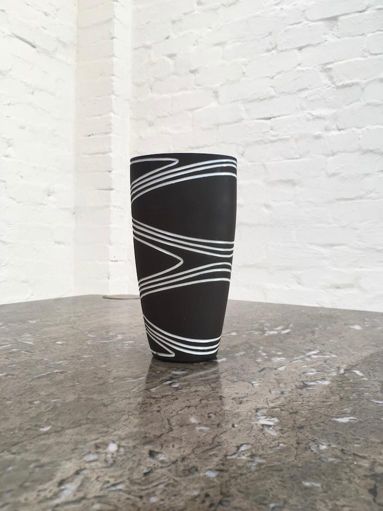 Tribal themed Jaap Ravelli vase. Signed. Model number 37. Another matching is also listed. 

Condition is aged but clean and sound.