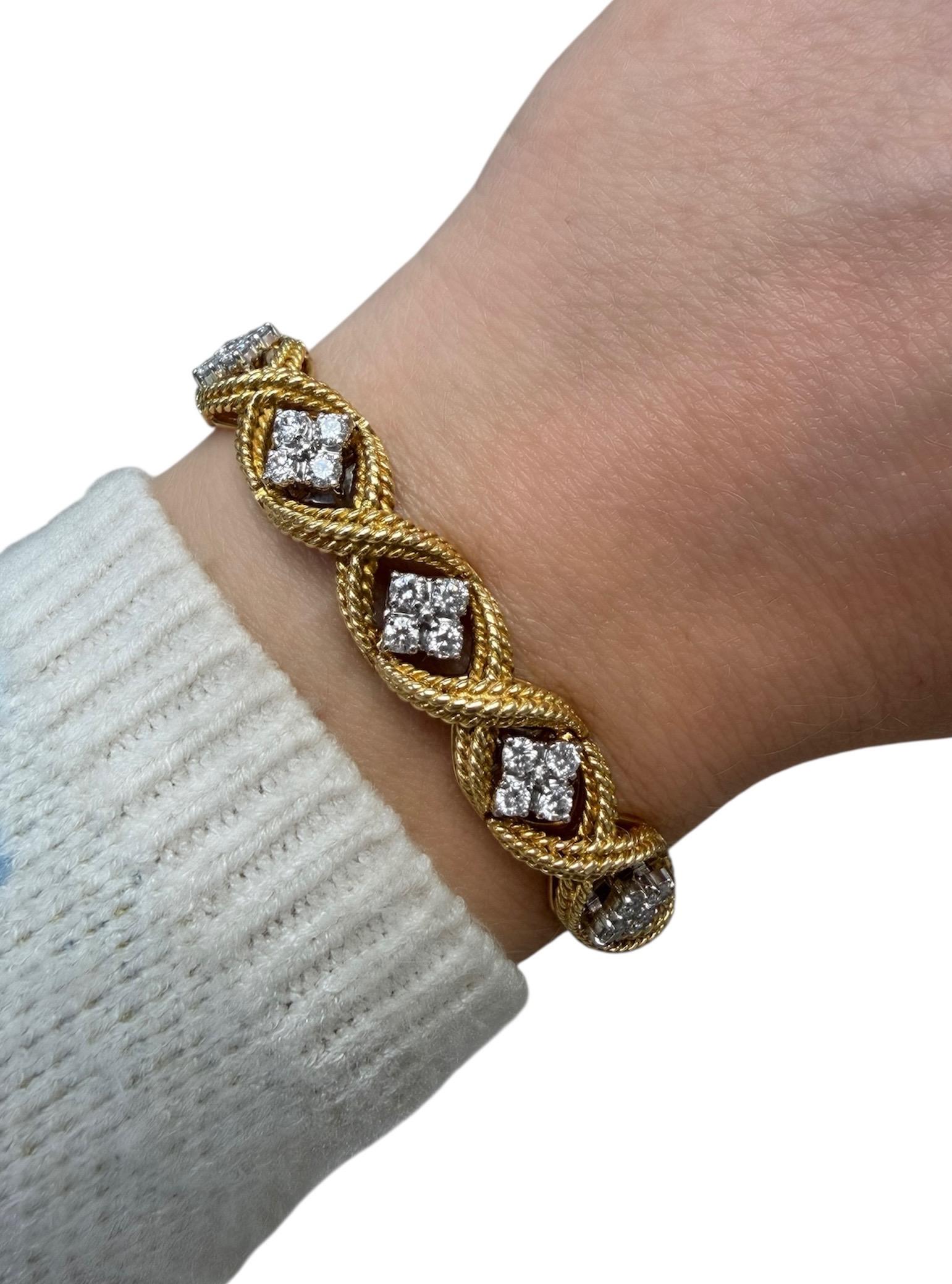 This classic designed bracelet by Jabel contains 47 top quality round brilliant cut diamonds weighing approximately 3.30 carats total. In an twisted rope link design and beautifully crafted in 18 karat white and yellow gold, this bracelet is