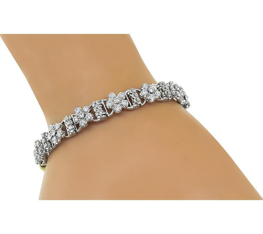 This is a gorgeous 18k white gold and 14k yellow gold bracelet by Jabel. The bracelet is set with sparkling round cut diamonds that weigh approximately 2.50ct. The color of these diamonds is F with VS clarity. The bracelet measures 8mm in width and