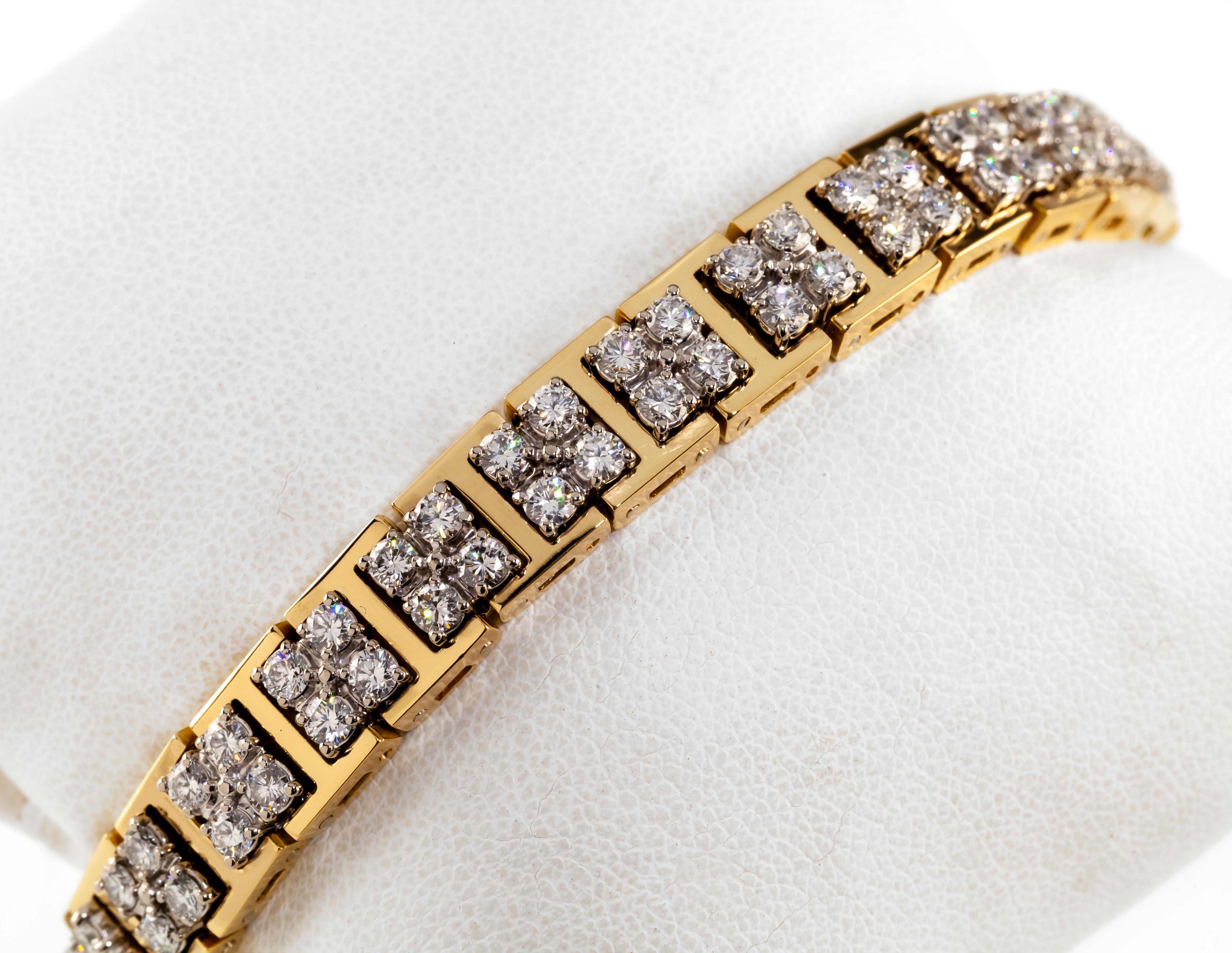 Gorgeous Vintage Jabel Add-A-Link Bracelet
Features 14 Four-Diamond Stations set in 18k Yellow/White Gold
Each Stone Appx 0.10 ct
Total Carat Weight = Appx 5.6 Ct
Average Color = F or better
Average Clarity = VS or Better
Total Length of Bracelet =