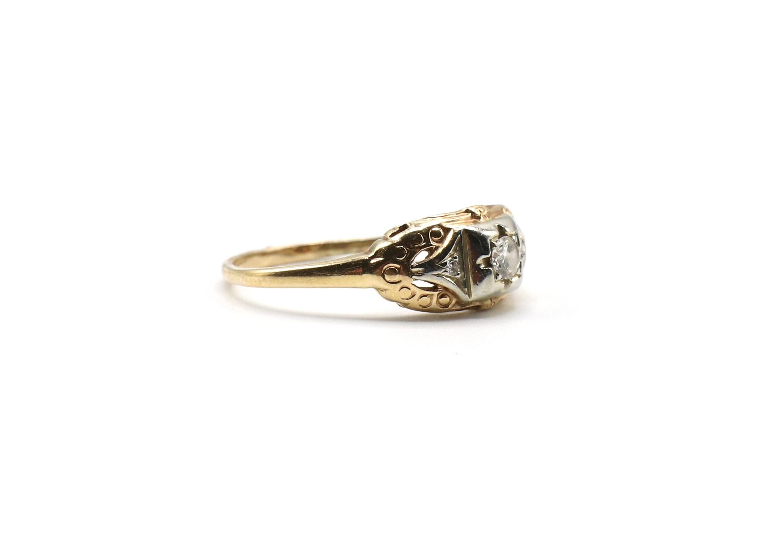 Jabel Diamond Cocktail Two-Tone Gold Engagement Ring

Metal: 14/18k yellow & white gold
Diamonds: 3 old European cut round diamonds, approx. .12 CTW G-H SI . The center diamond is approx. .10 cts
Size: 8
Signed: 