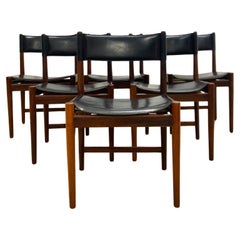 Chaises en jacaranda et cuir d'Arne vodder