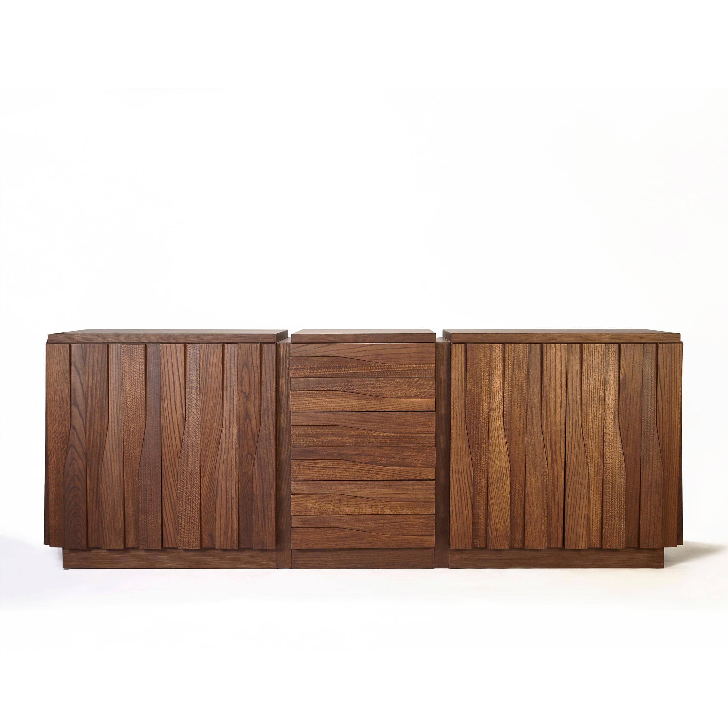 Jacaranda Sideboard by DUISTT
Dimensions: W 216 x D 55 x H 80 cm
Materials: Stained Solid Oak

The Jacarandá sideboard was designed to pursuit the beauty of volume and form. Throughout an elegant,
balanced and exquisite detailing structure, this