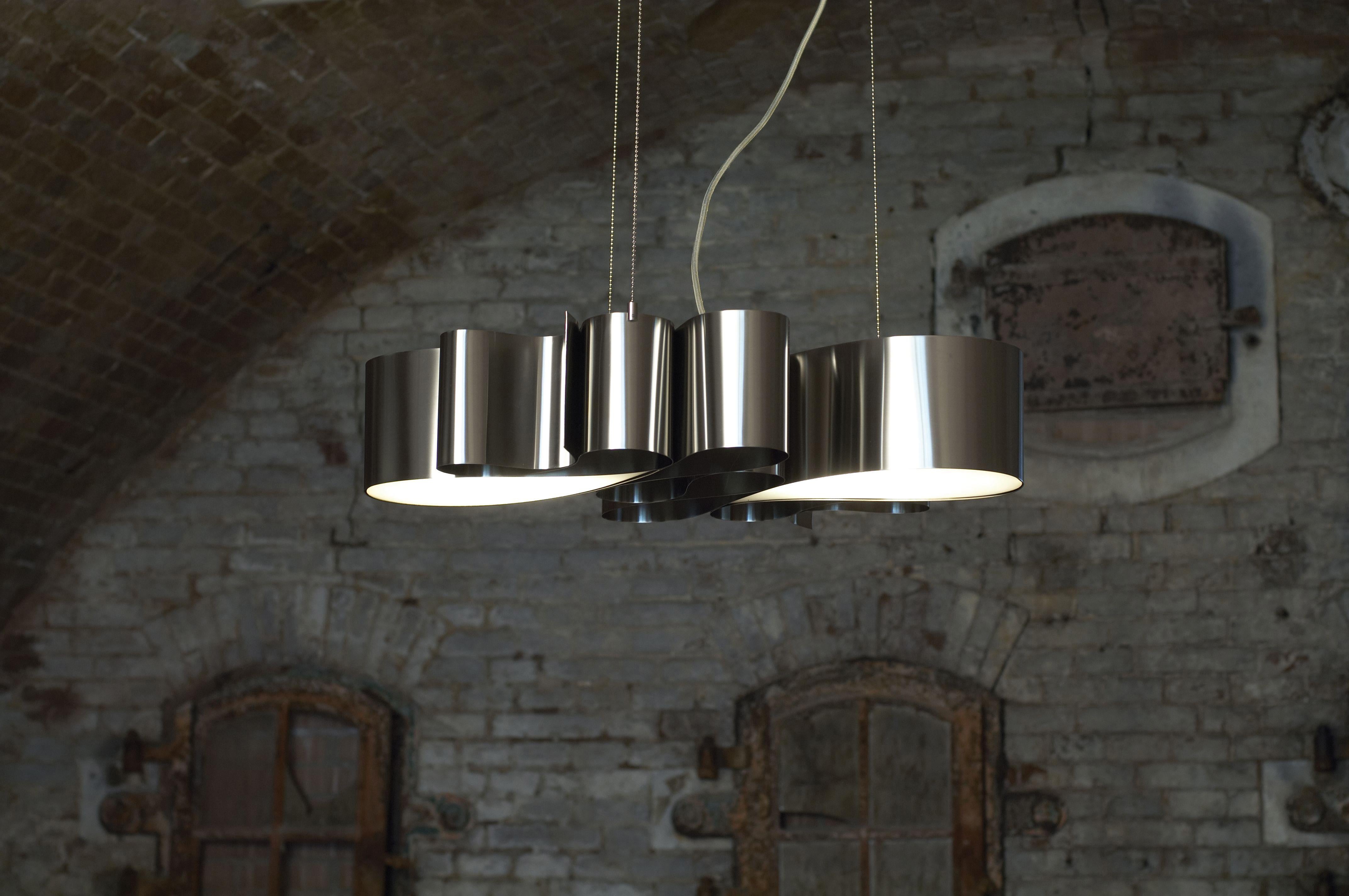 Handmade in Holland not only has a nice “ring” to it, it means Jacco Maris’ fixtures exhibit exemplary quality and jaw-dropping style only a lover of experimentation could achieve. 

The Paraaf pendant was created by hand from a single strip of