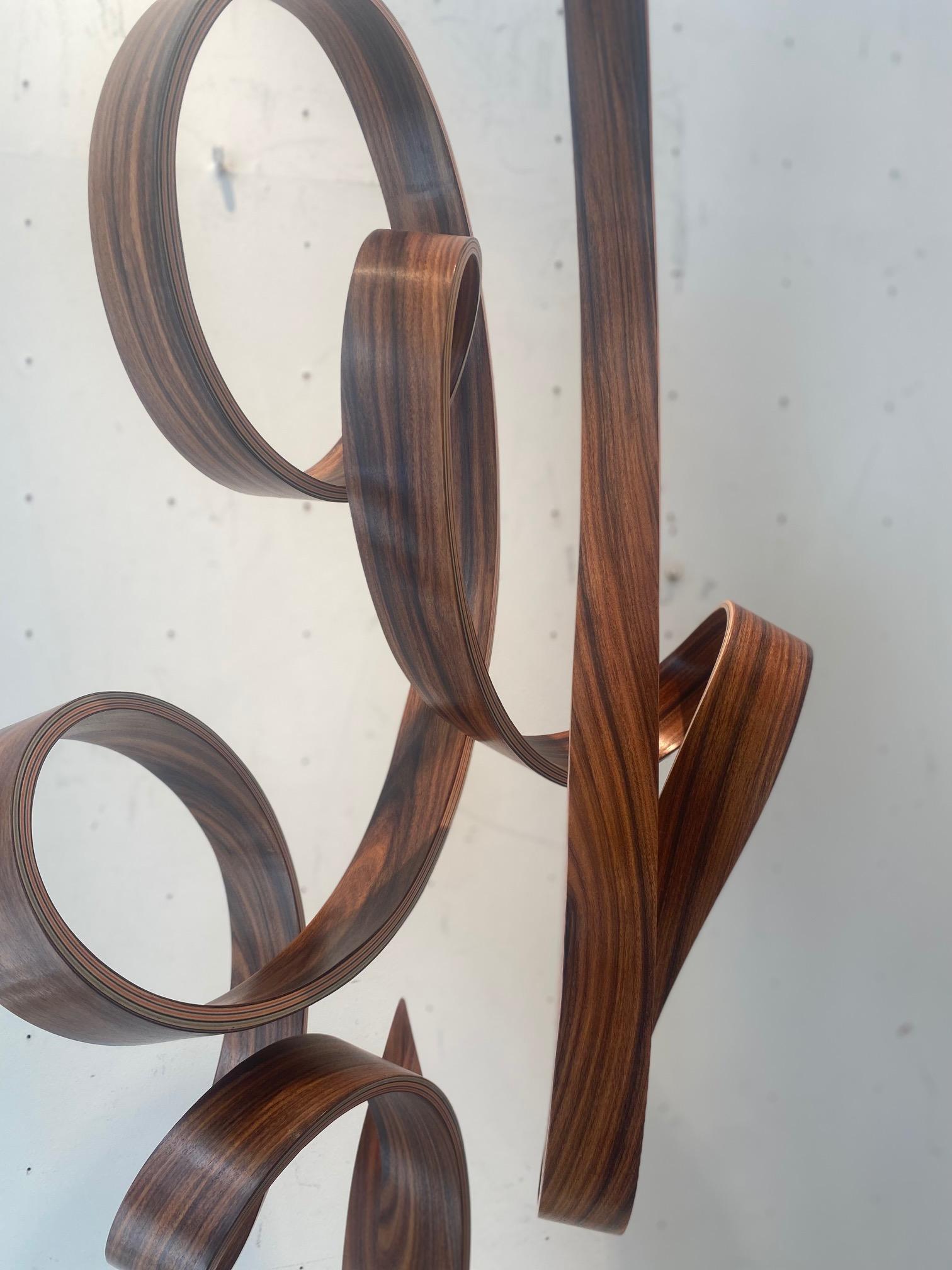 MWT-curvilinear minimalist maple wood sculpture defying gravity by Jacinto Moros 6