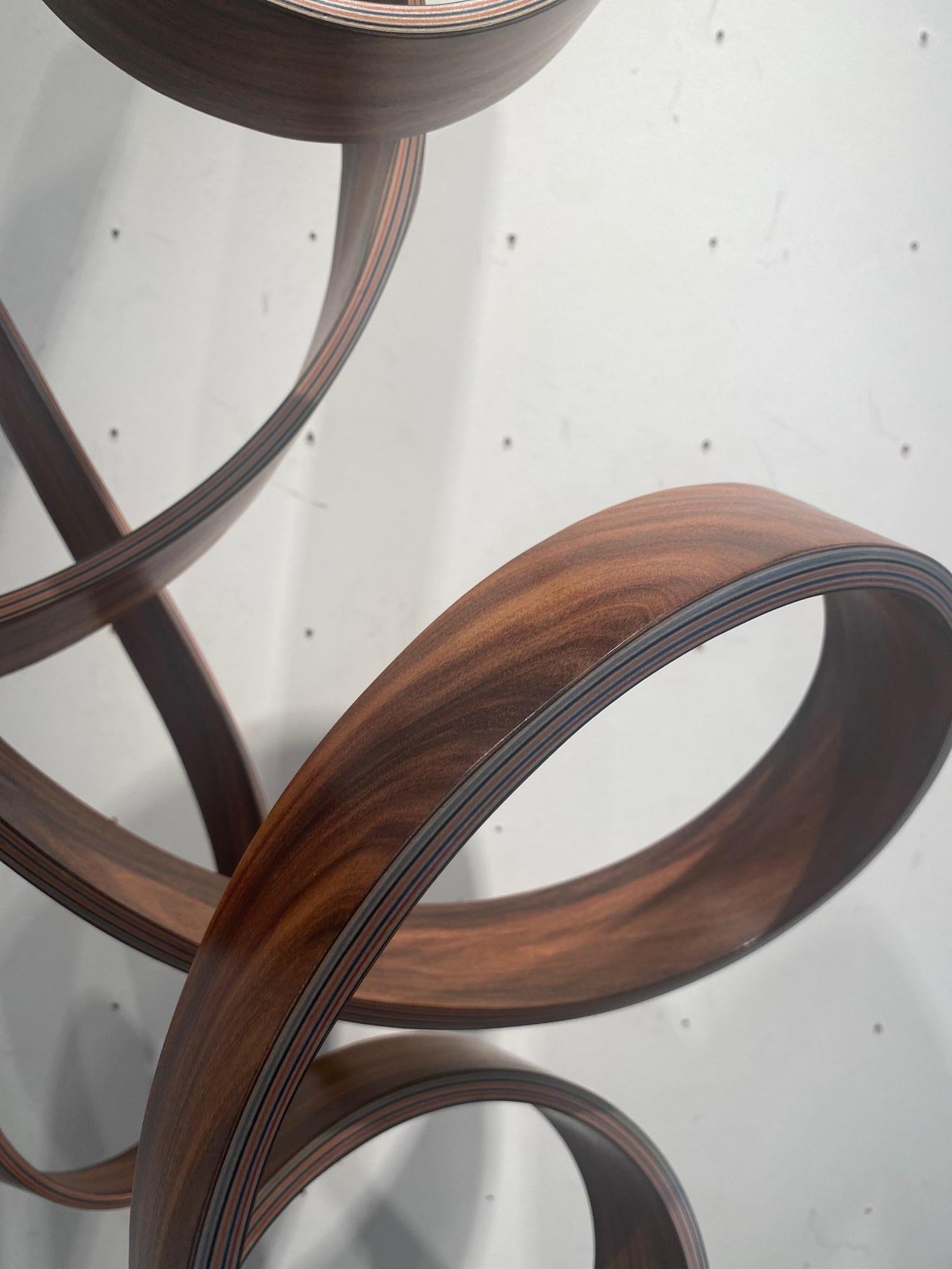 MWT-curvilinear minimalist maple wood sculpture defying gravity by Jacinto Moros 1
