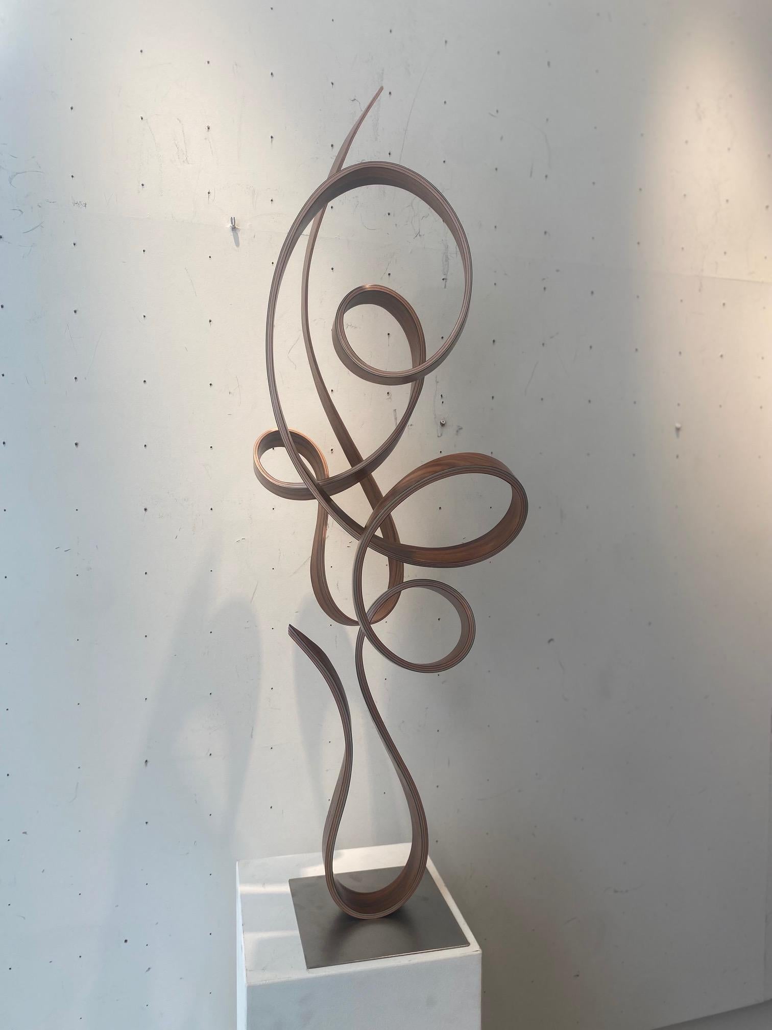 MWT-curvilinear minimalist maple wood sculpture defying gravity by Jacinto Moros 3
