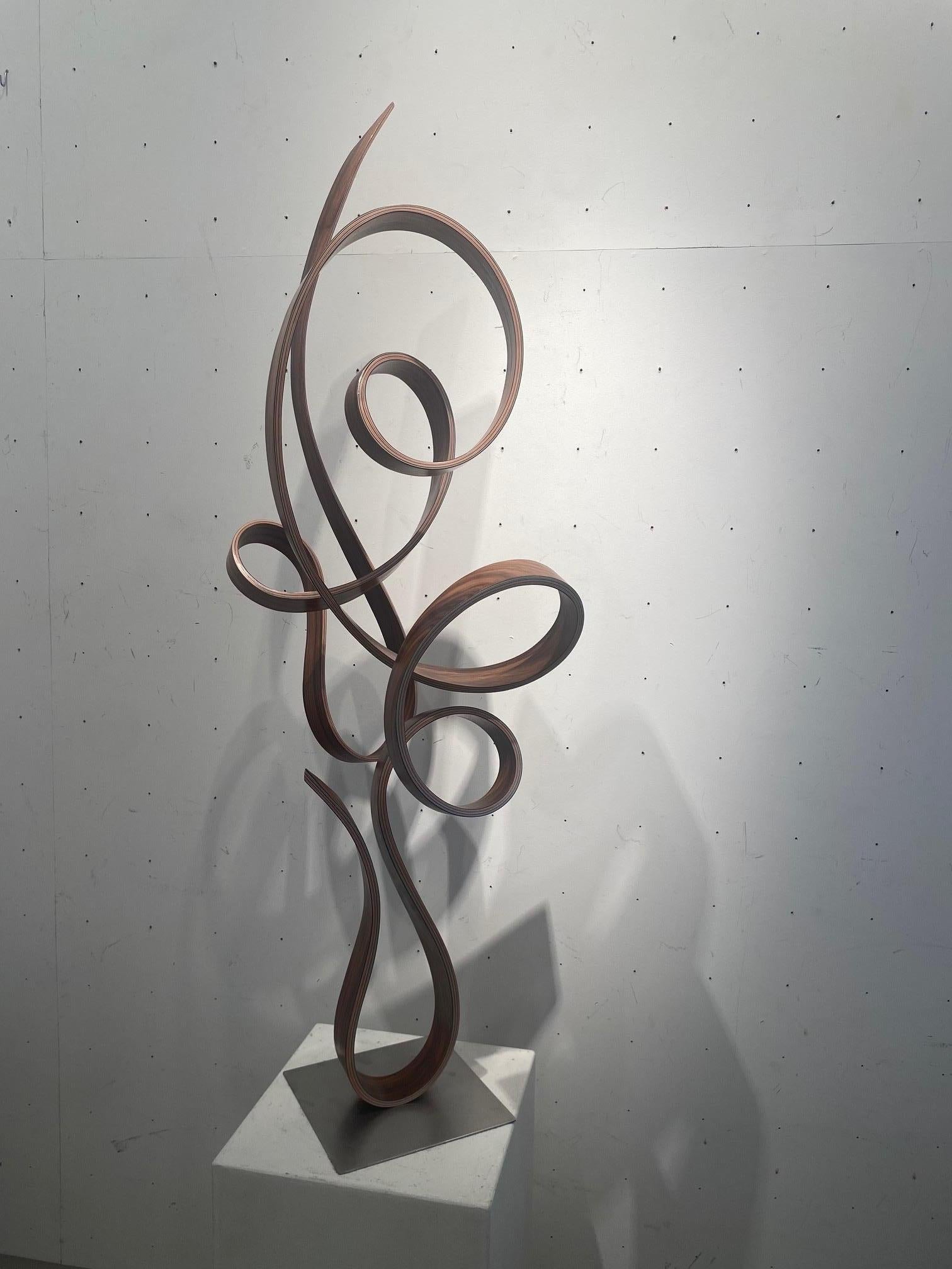 MWT-curvilinear minimalist maple wood sculpture defying gravity by Jacinto Moros