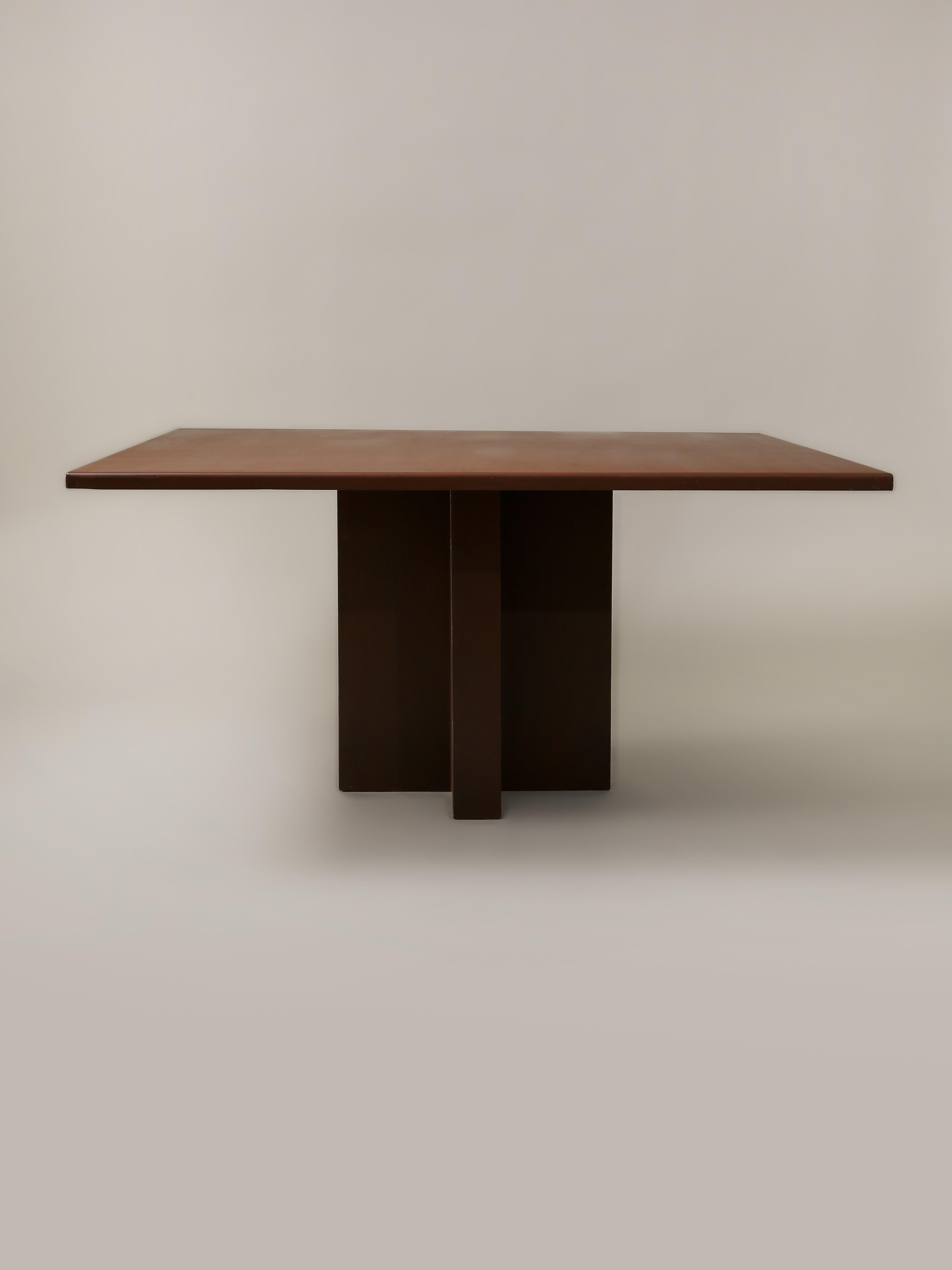 This powder-coated steel table was designed by the late landscape architect, sculptor, and furniture designer, Jack A. Chandler. The square tabletop is supported by a cross pedestal base.

Measures: Overall Width: 60