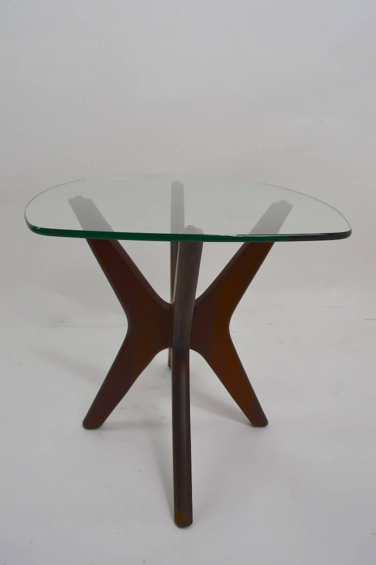 Classic Jack base end table designed by Adrian Pearsall for Craft Associates. This example has its original plate glass top, and the wood base is in original finish. Clean, ready to use condition, stylish and chic.