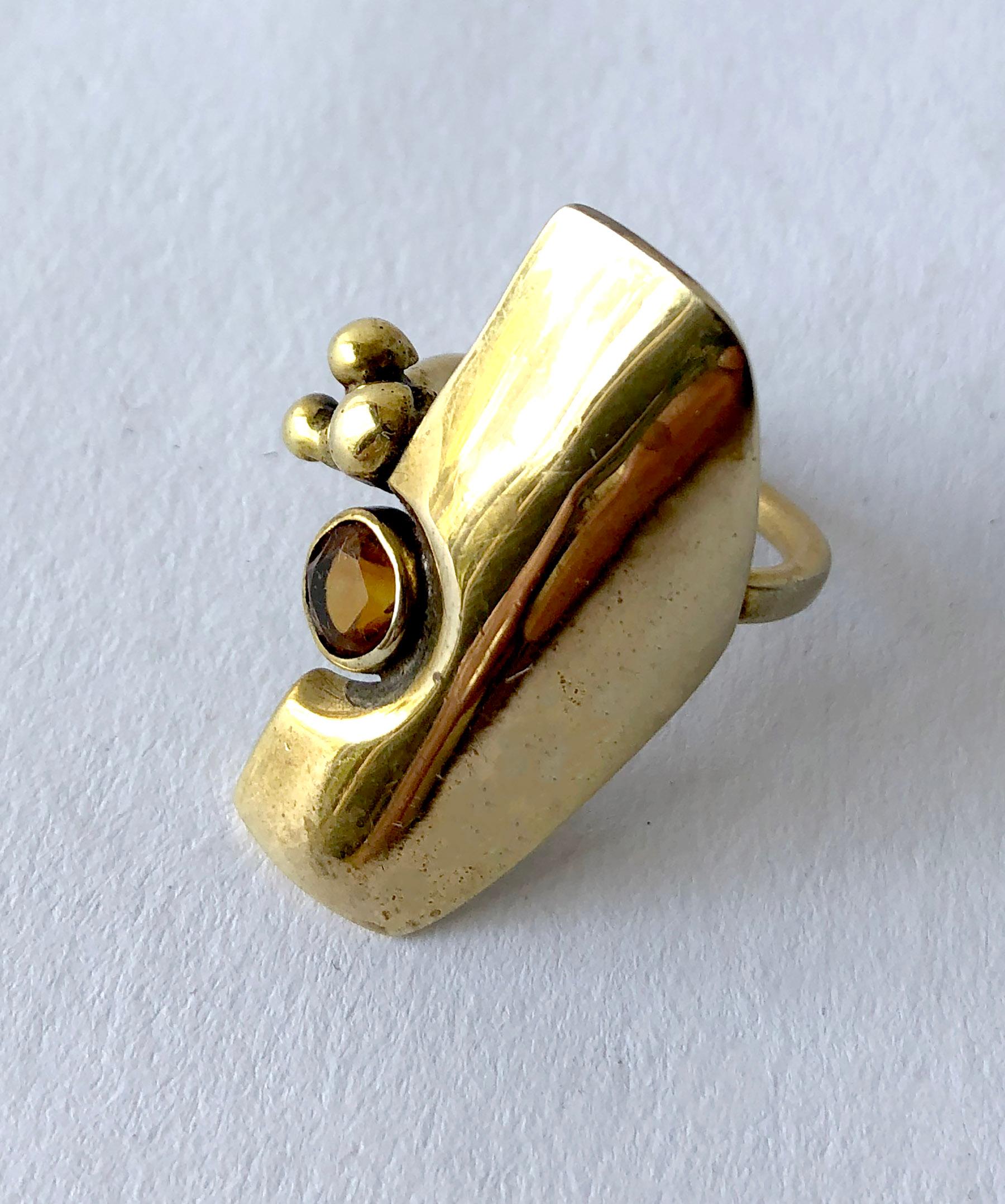 Bronze and faceted citrine ring created by Jack Boyd of San Diego, California.  Ring is a finger size 7.25 and is signed with the artists' hallmark of JB.  In very good vintage condition.
Boyd was a well respected member of the Allied Craftsmen of