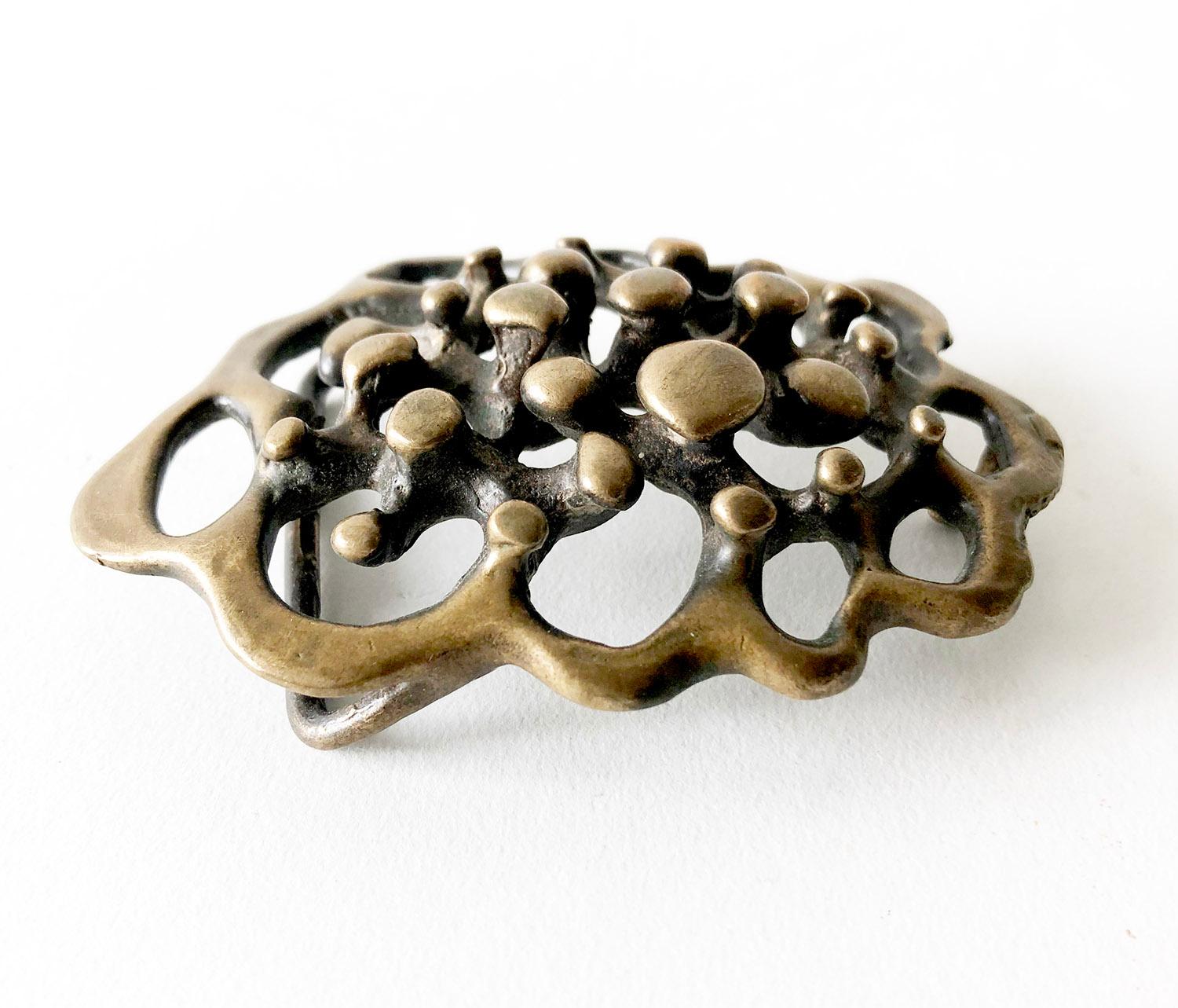 Hand forged, large scale spore belt buckle created by Jack Boyd of San Diego, California.  Buckle measures 3