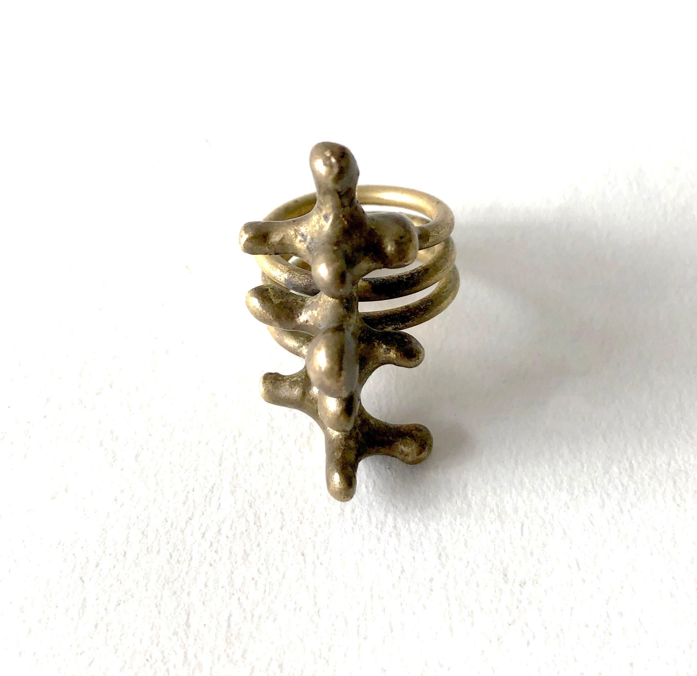 Bronze spore ring created by Jack Boyd of San Diego, California.  Ring is a finger size 6 and measures 1.5
