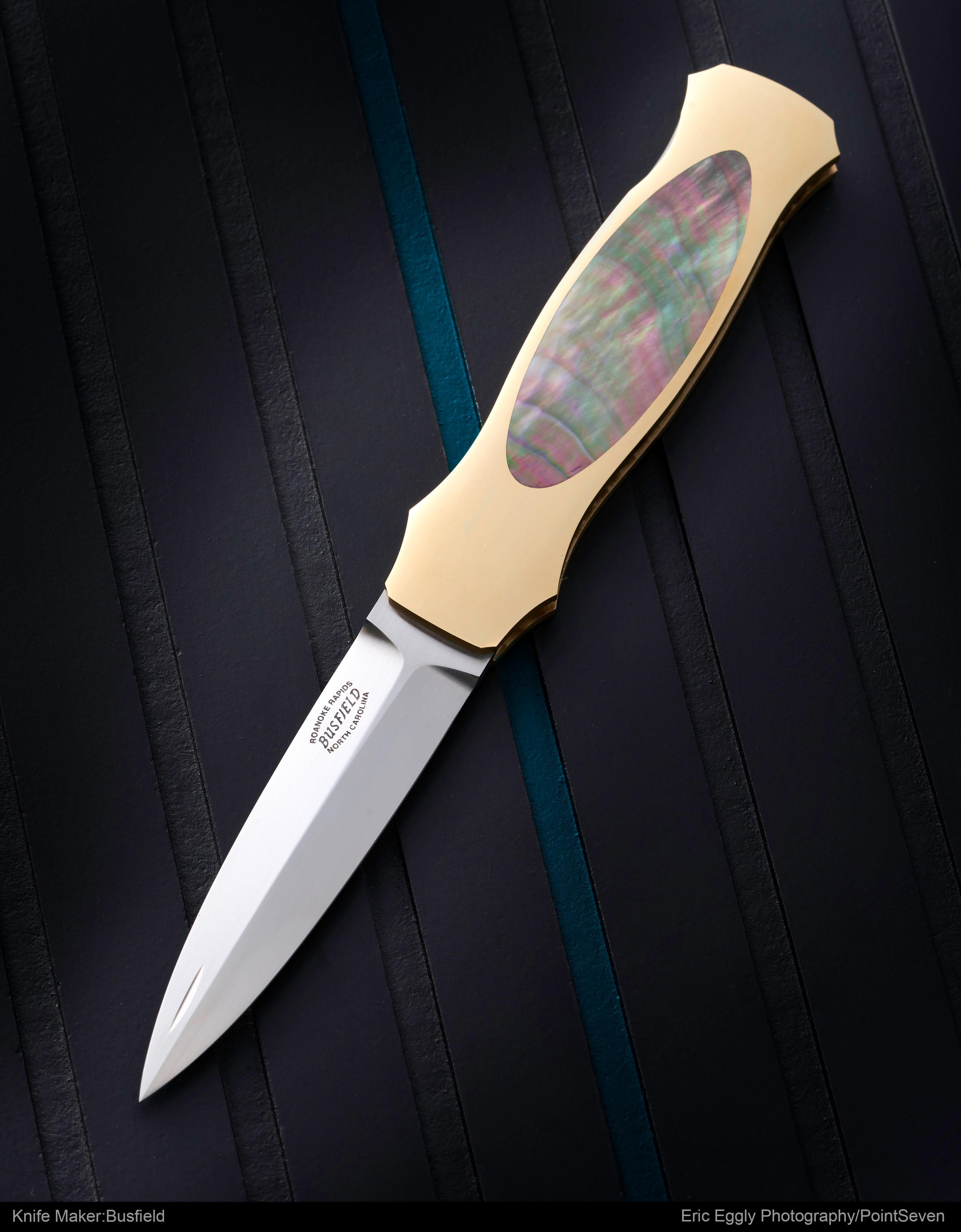 Jack Busfield, 18K Dagger, black lip pearl. 6 inch overall, 3 3/8 body
Photography by Eric Eggly
