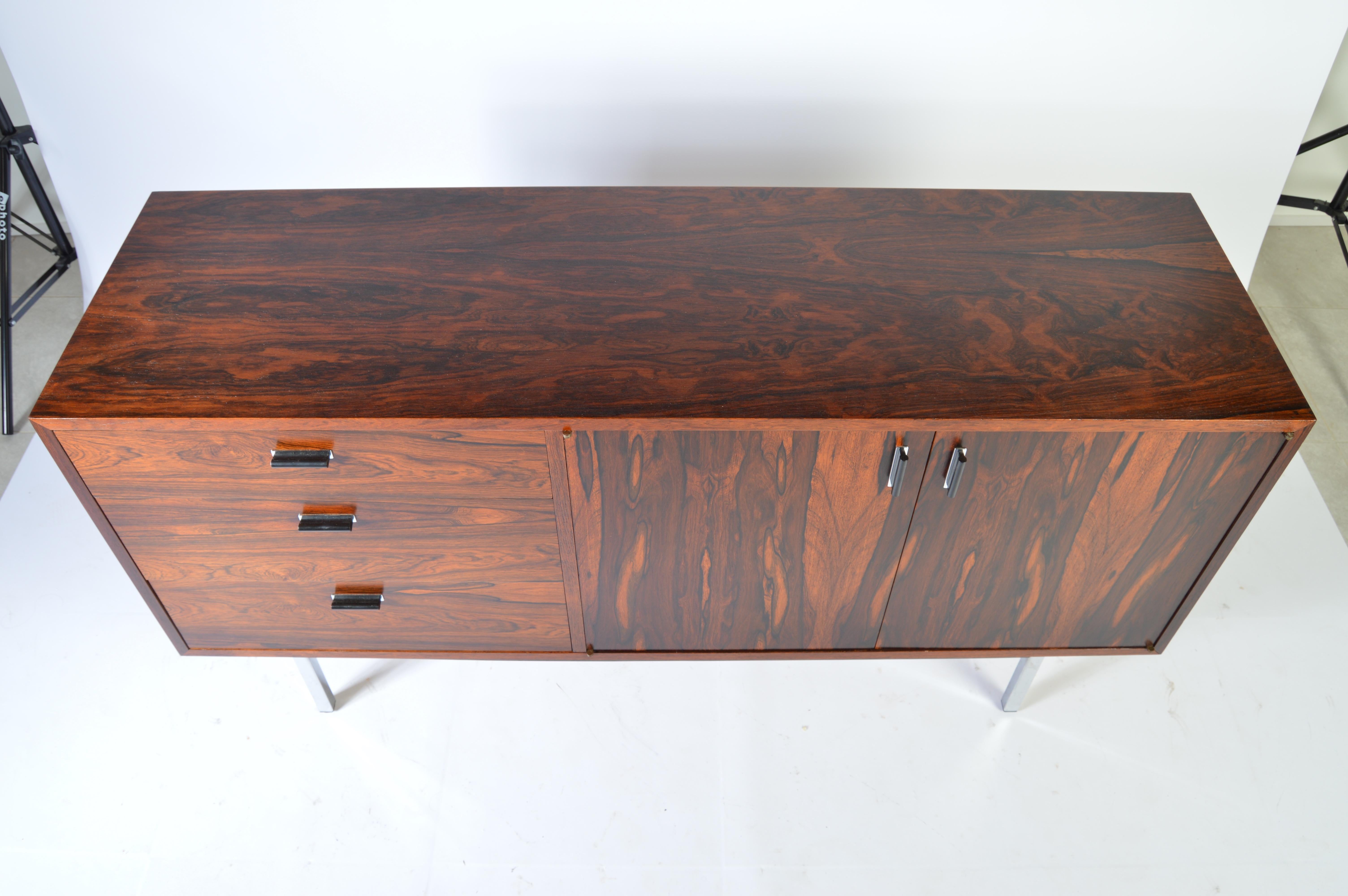 Stunning grain having book matched drawers and doors. Masterfully refinished.
A truly stunning credenza in the manner of Harvey Probber.