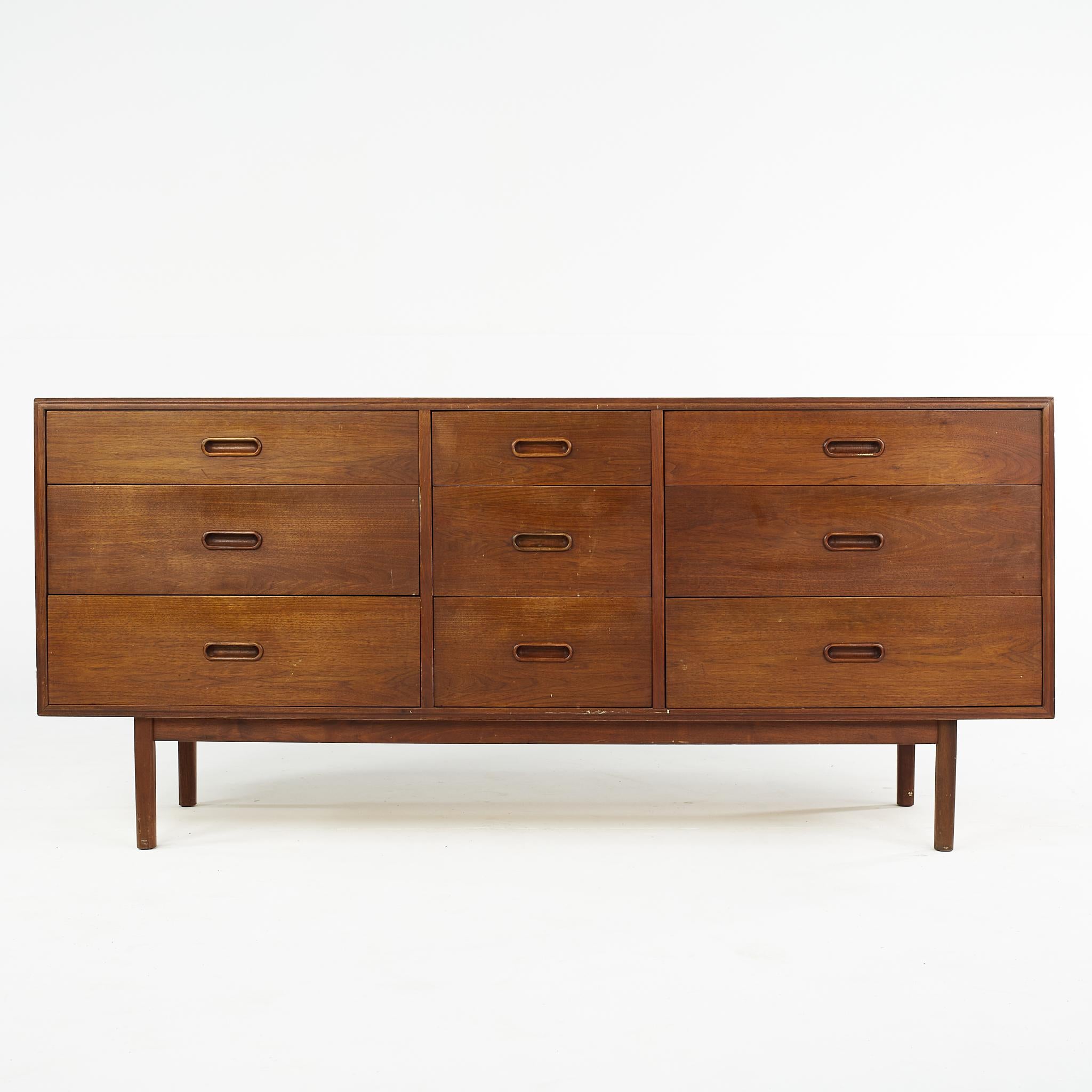 Jack Cartwright for Founders mid century lowboy dresser

This dresser measures: 67 wide x 18 deep x 30 inches high

All pieces of furniture can be had in what we call restored vintage condition. That means the piece is restored upon purchase so