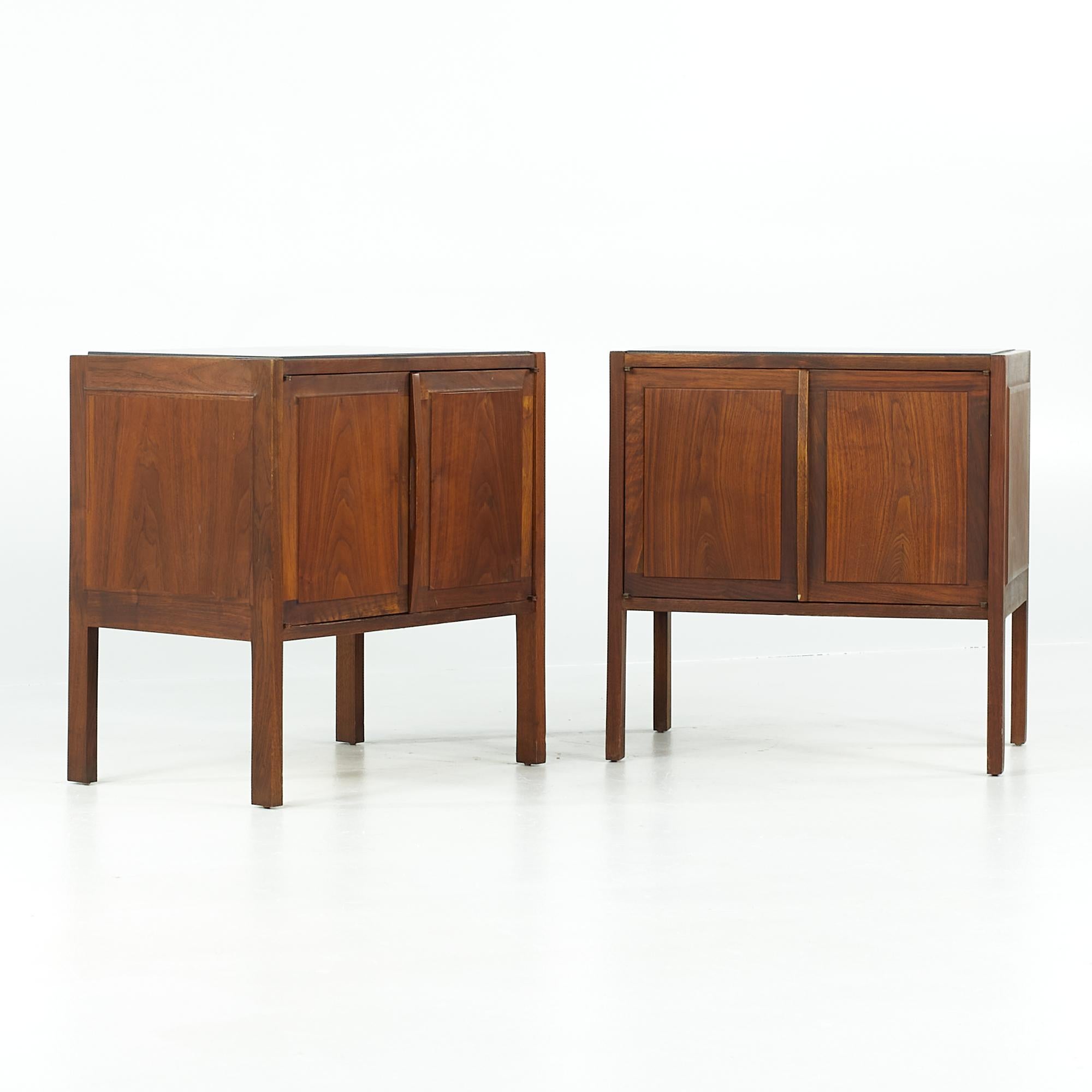 Jack Cartwright for Founders midcentury walnut nightstands - pair

Each nightstand measures: 22.25 wide x 15 deep x 23.25 inches high

All pieces of furniture can be had in what we call restored vintage condition. That means the piece is