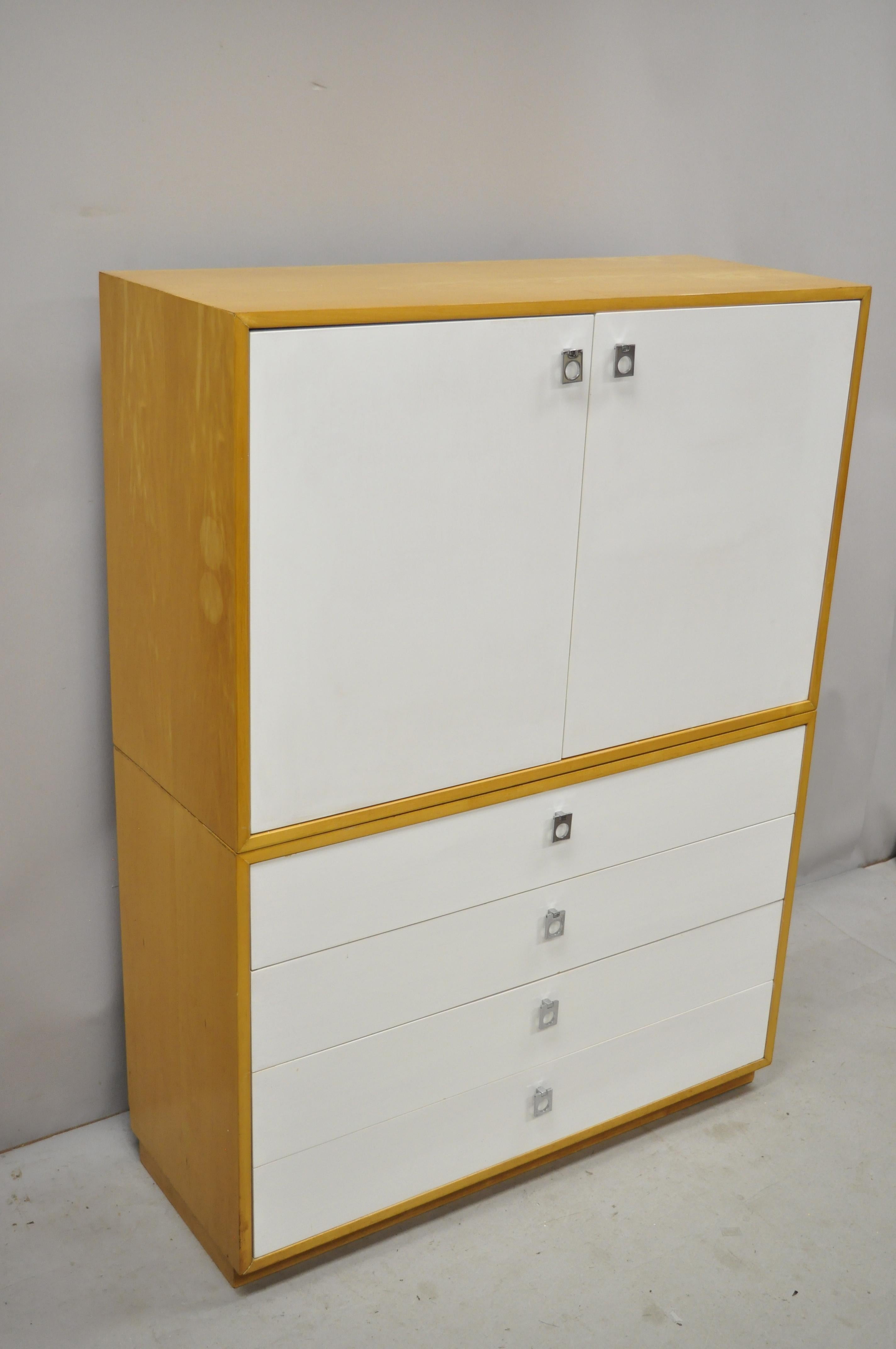 Jack Cartwright for Founders Mid-Century Modern birch wood tall chest dresser cabinet. Item features 2 part construction, 2 swing doors, white lacquered drawer fronts, original label, 4 dovetailed drawers, clean modernist lines, great style and