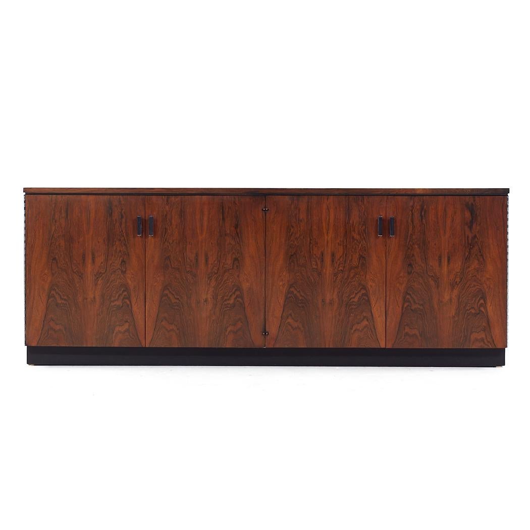 Jack Cartwright Founders Mid Century Rosewood Credenza

This credenza measures: 72.25 wide x 18.25 deep x 27 inches high

All pieces of furniture can be had in what we call restored vintage condition. That means the piece is restored upon purchase