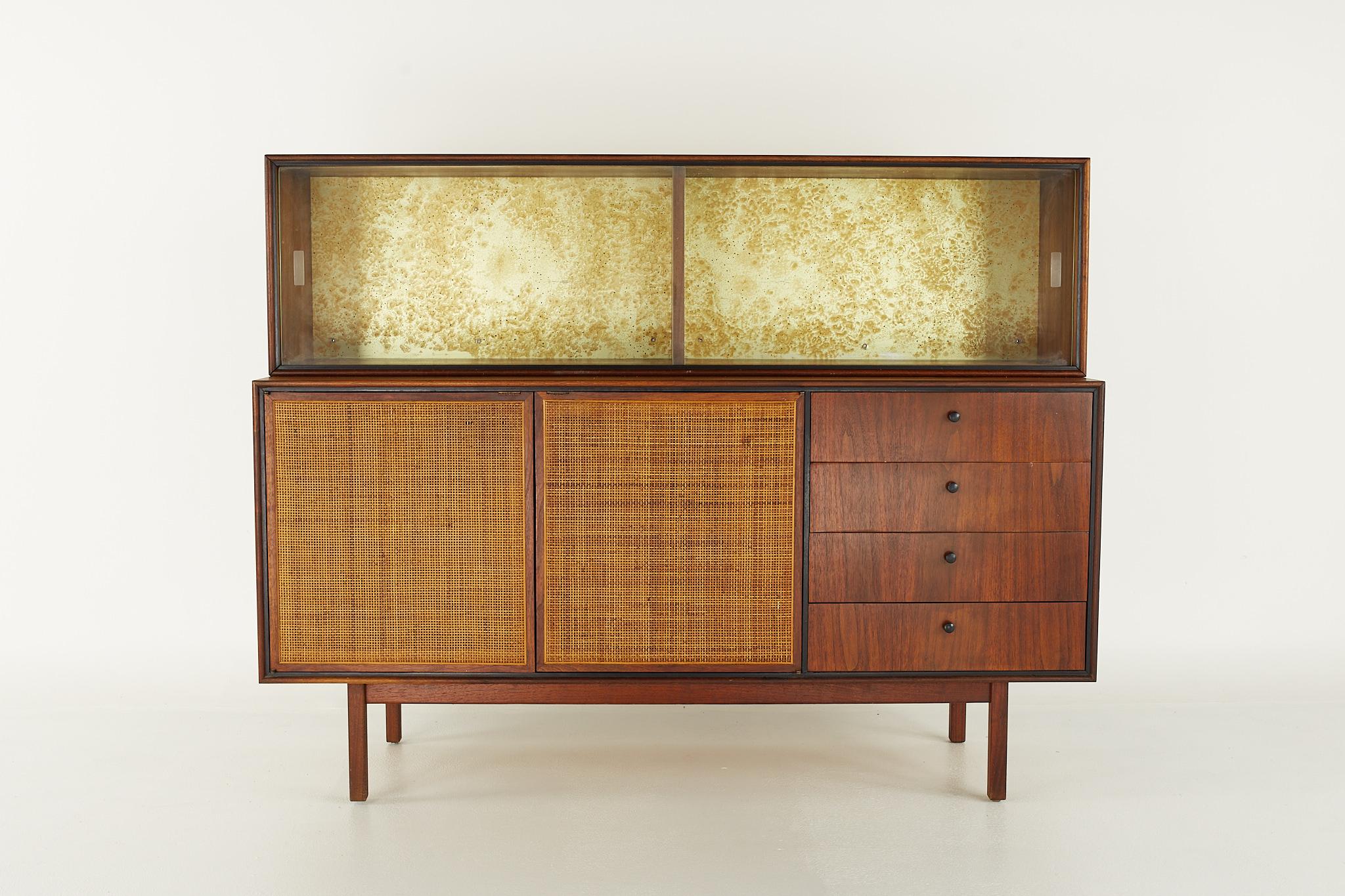 Jack Cartwright style founders mid century cane front credenza with hutch

Credenza measures: 60 wide x 8 deep x 30.5 inches high
Hutch measures: 60 wide x 13 deep x 16 inches high

?All pieces of furniture can be had in what we call restored