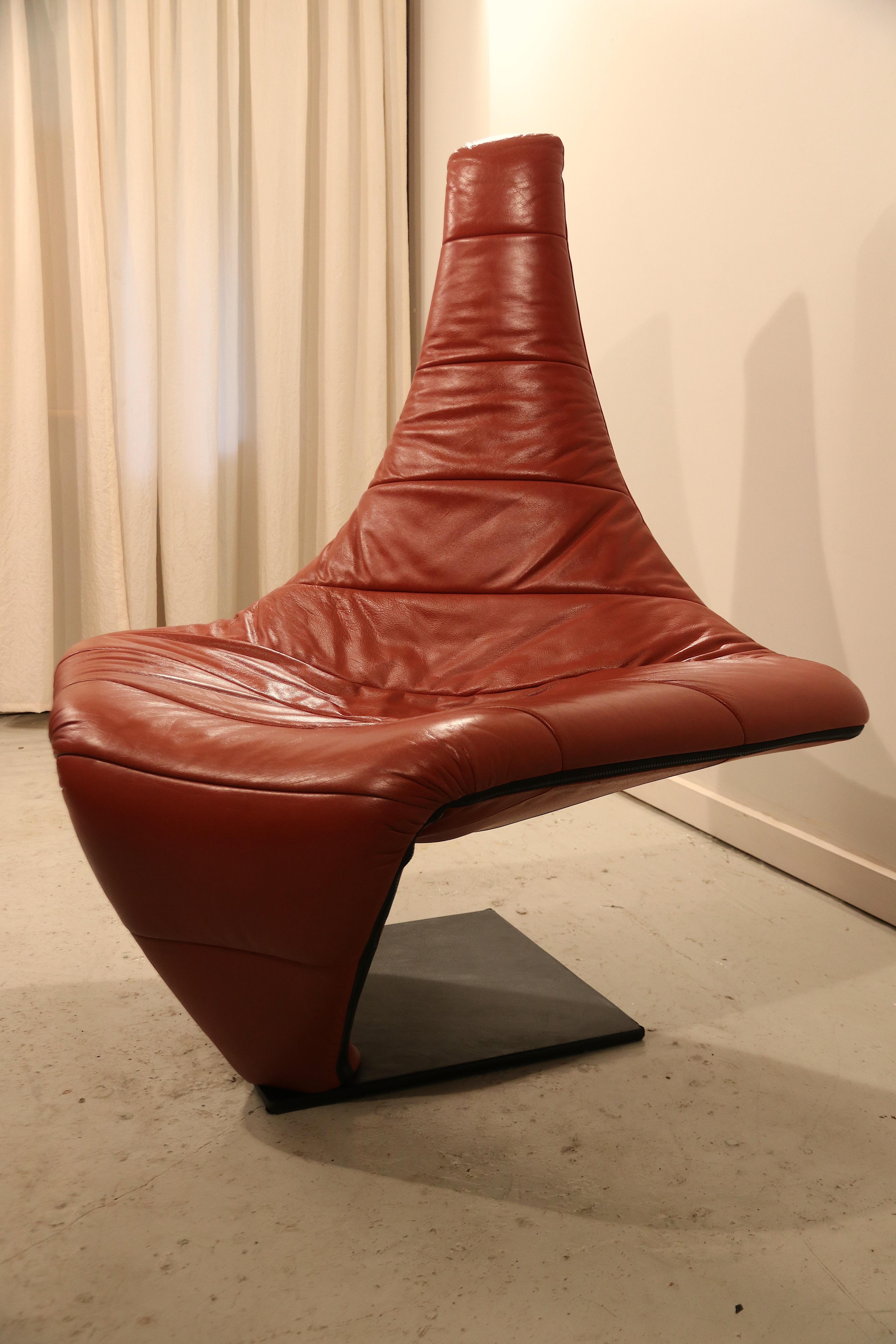 Beautiful sculptural black leather lounge chair named Turner, and nicknamed 