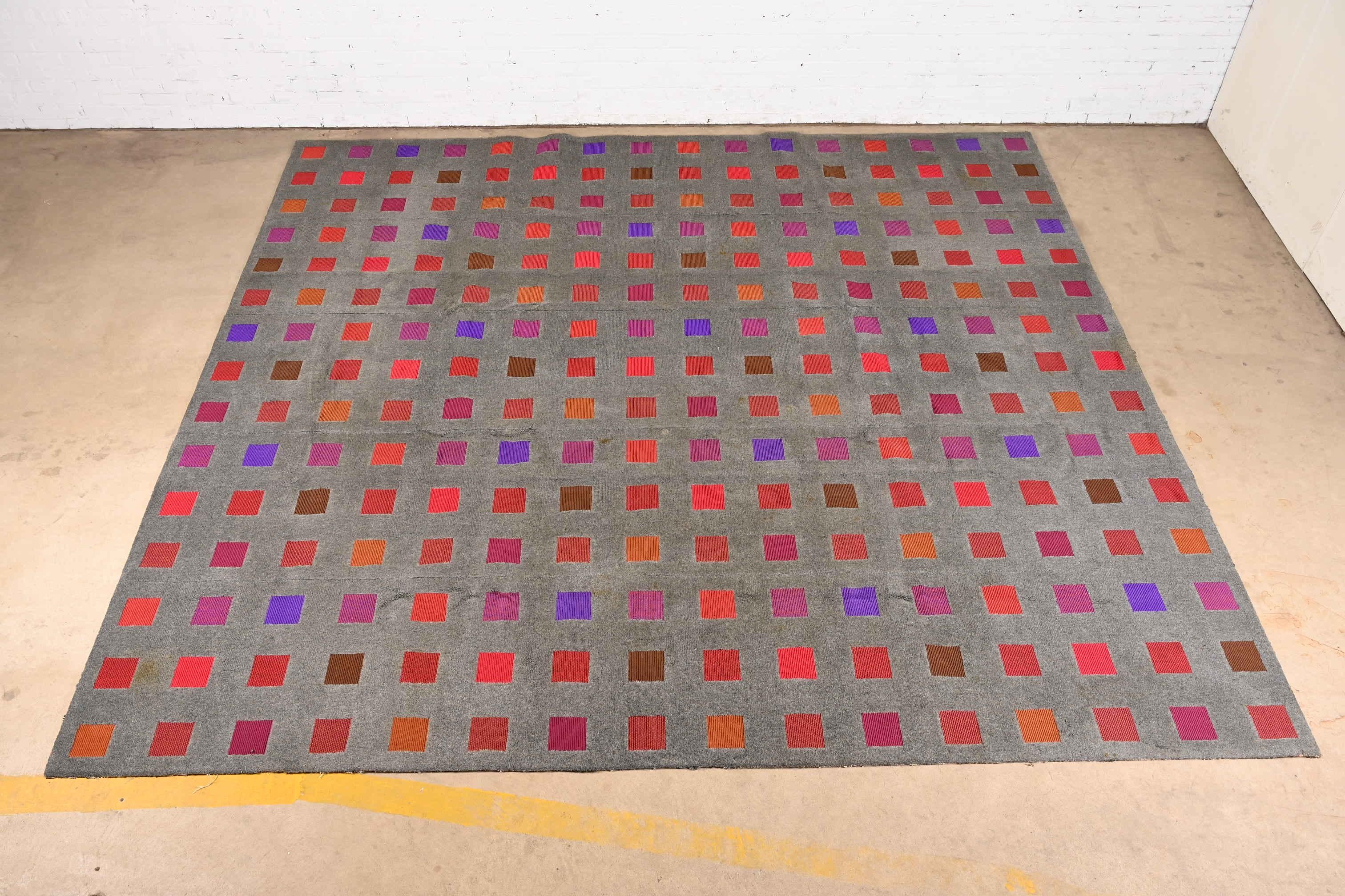 A gorgeous Mid-Century Modern room size wool carpet

By Jack Lenor Larsen

USA, 1973

Wool pile, with gray field and vibrant multi-color geometric design.

Measures: 11'3