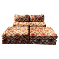 Jack Lenor Larson style armless loveseat with 2 ottomans