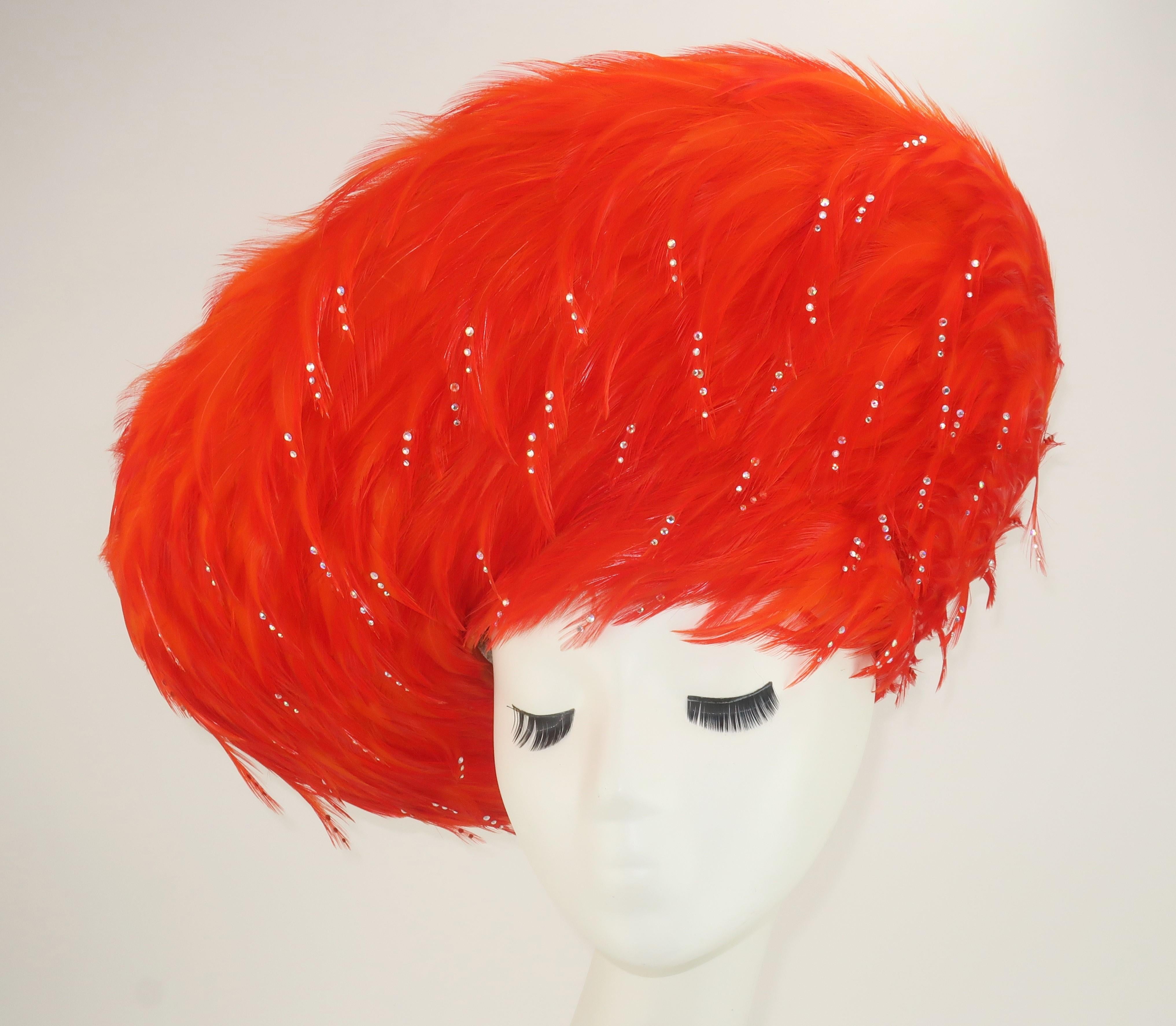 Nothing says 'glamour' like a fabulous feather creation by Jack McConnell, 'King of Millinery'.  Mr. McConnell's toppers were always creative and often incorporated a fantasy of feathers as part of the design.  This amazing example is a swirl of