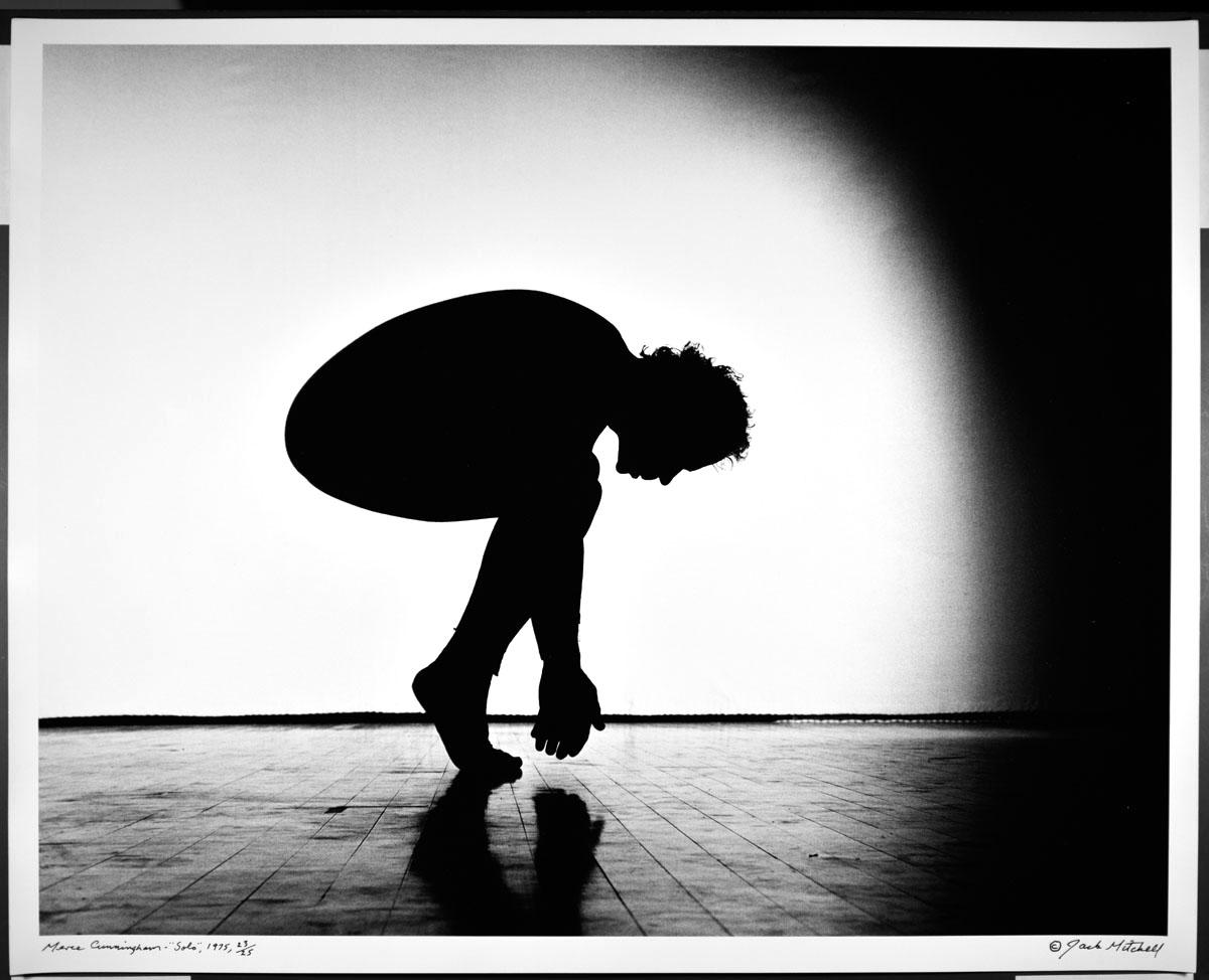 16 x 20" vintage silver gelatin photograph of Merce Cunningham performing "Solo", in 1975 numbered 23/25. It is signed by Jack Mitchell on the recto and in pencil on the verso. Comes directly from the Jack Mitchell Archives with a certificate of