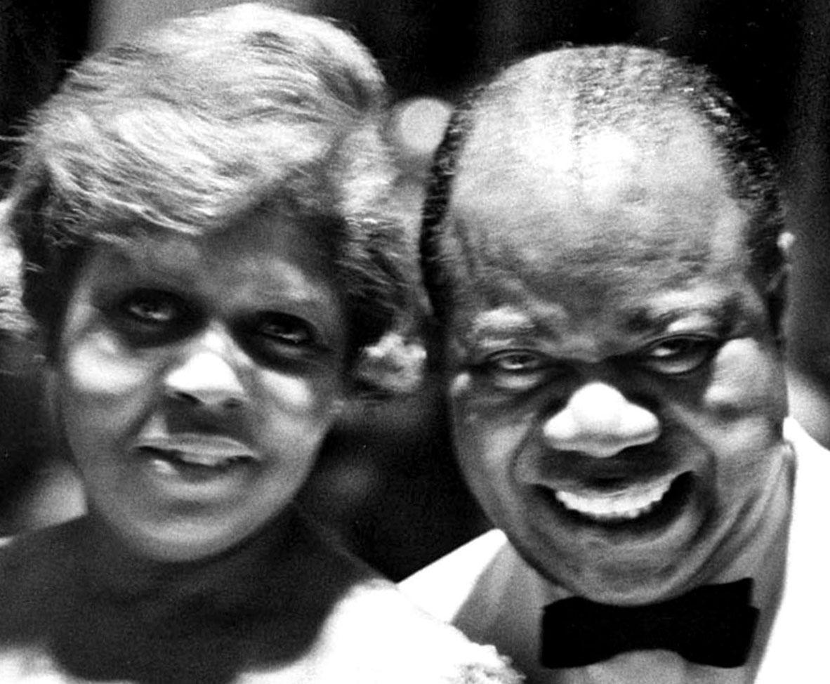 American trumpeter, composer and vocalist Louis Armstrong with his wife Lucille - Photograph by Jack Mitchell