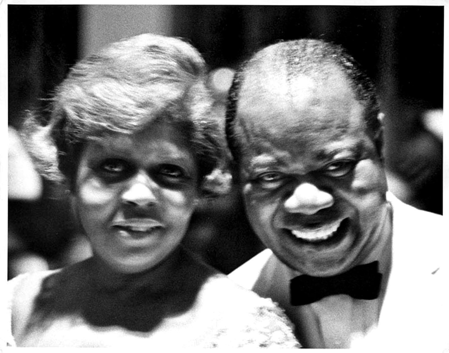 Jack Mitchell Black and White Photograph - American trumpeter, composer and vocalist Louis Armstrong with his wife Lucille