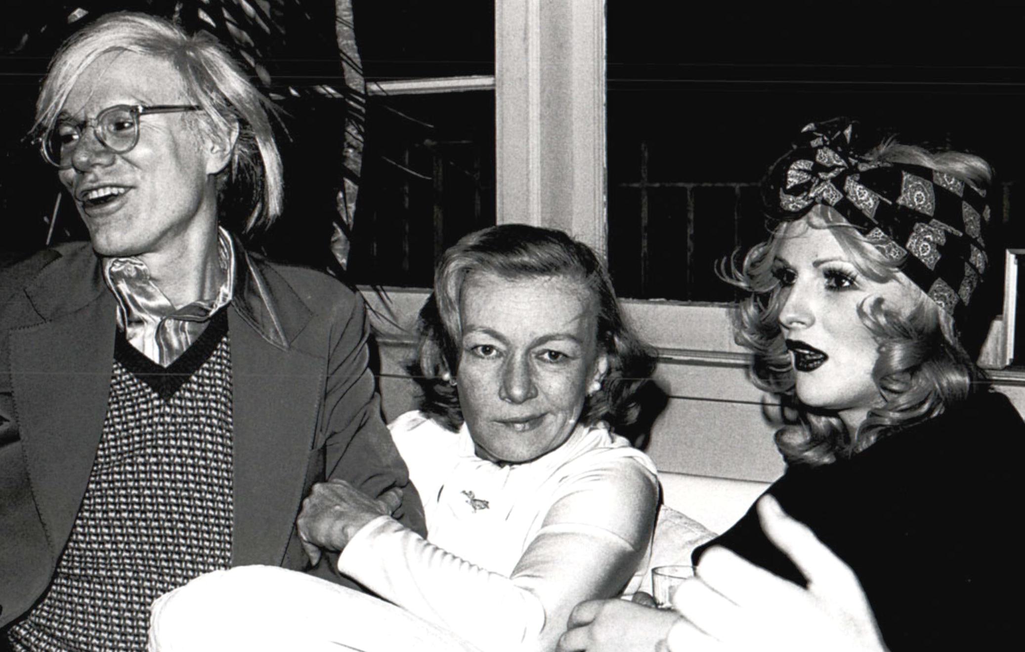 Andy Warhol, noir film star Veronica Lake & Candy Darling at a cocktail party - Photograph by Jack Mitchell