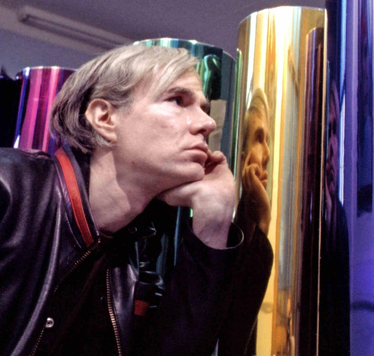 Andy Warhol photographed in his Union Square Factory - Photograph by Jack Mitchell